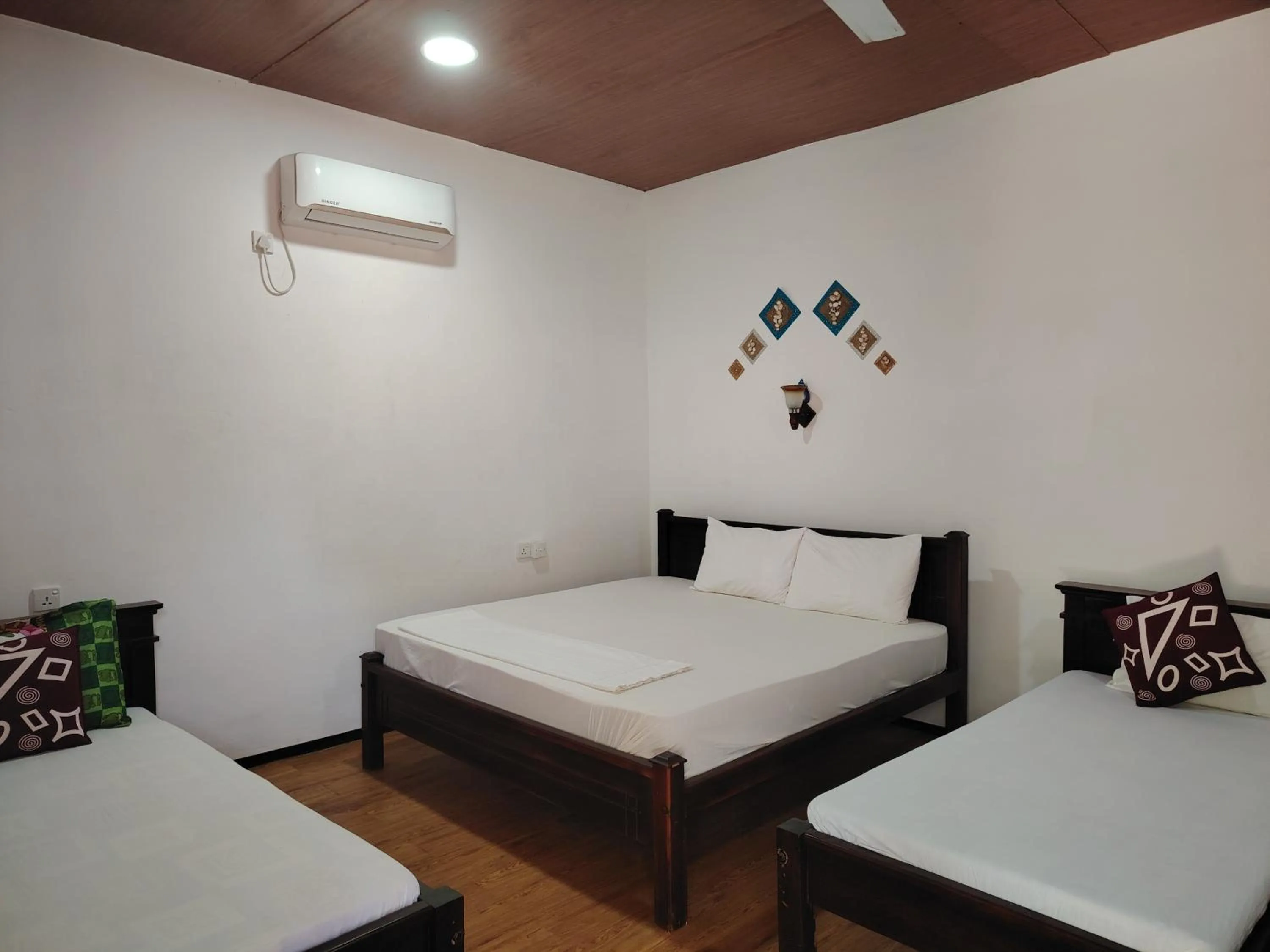 Bed in De Perla Resort