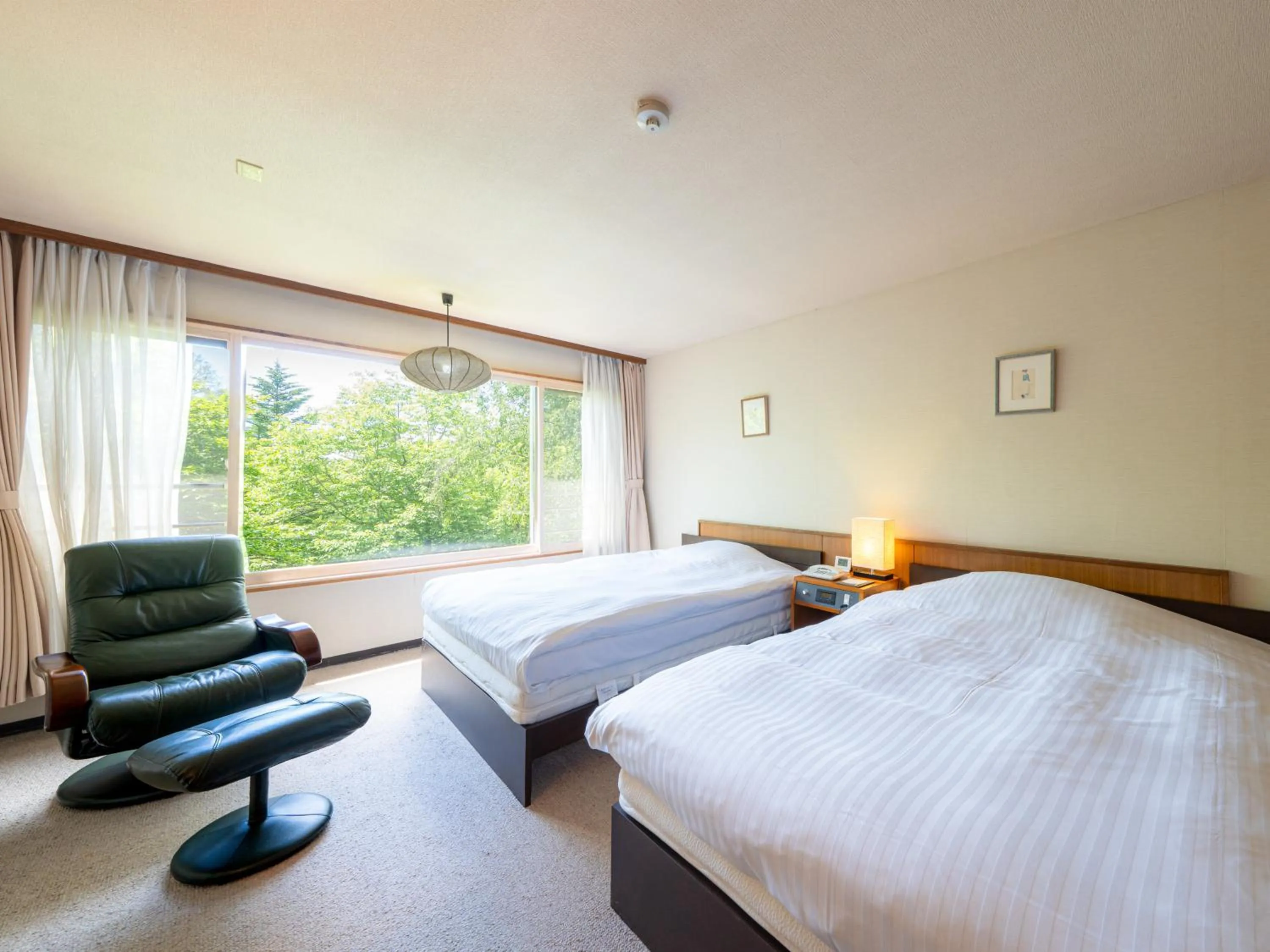 Bed in Okunikko Konishi Hotel