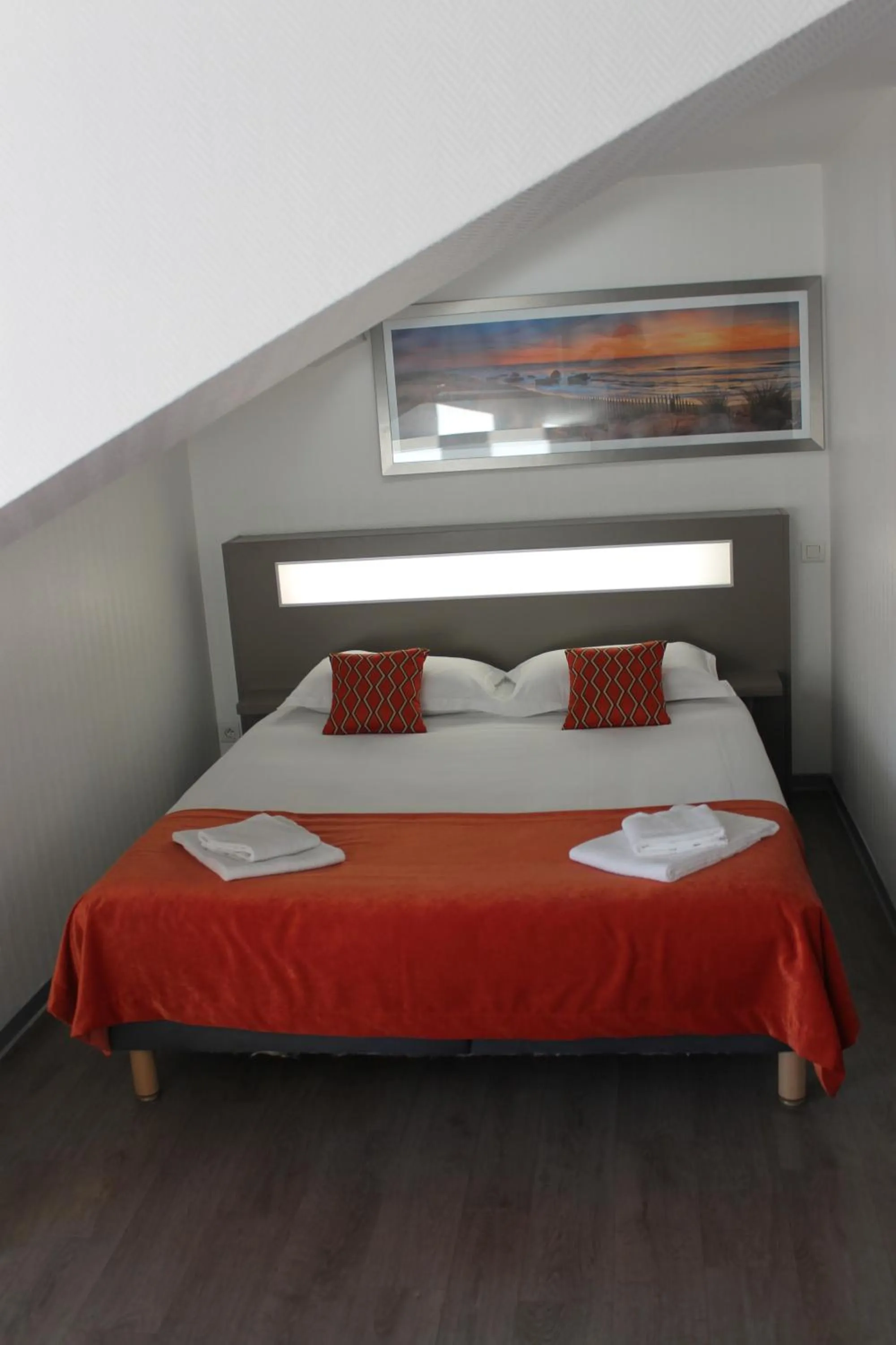 Bed in Hôtel du Centre