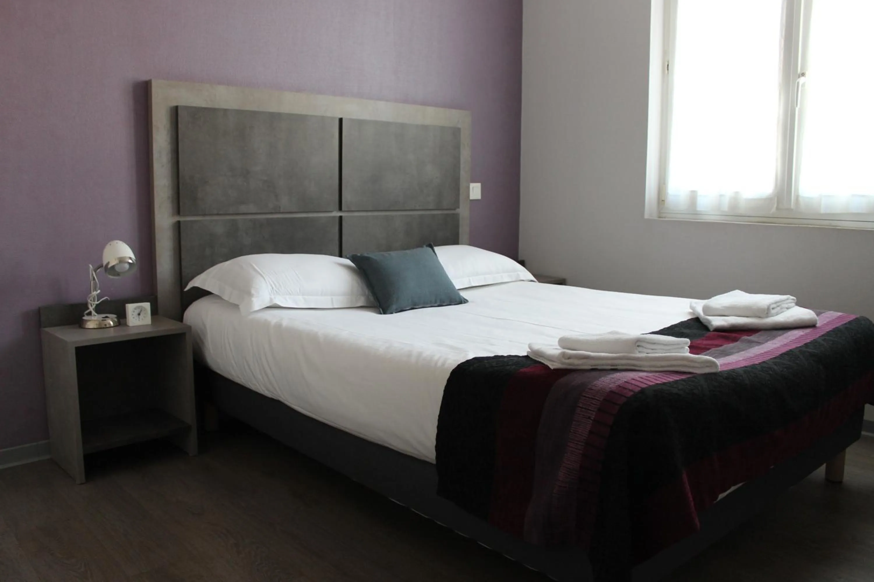 Bed in Hôtel du Centre