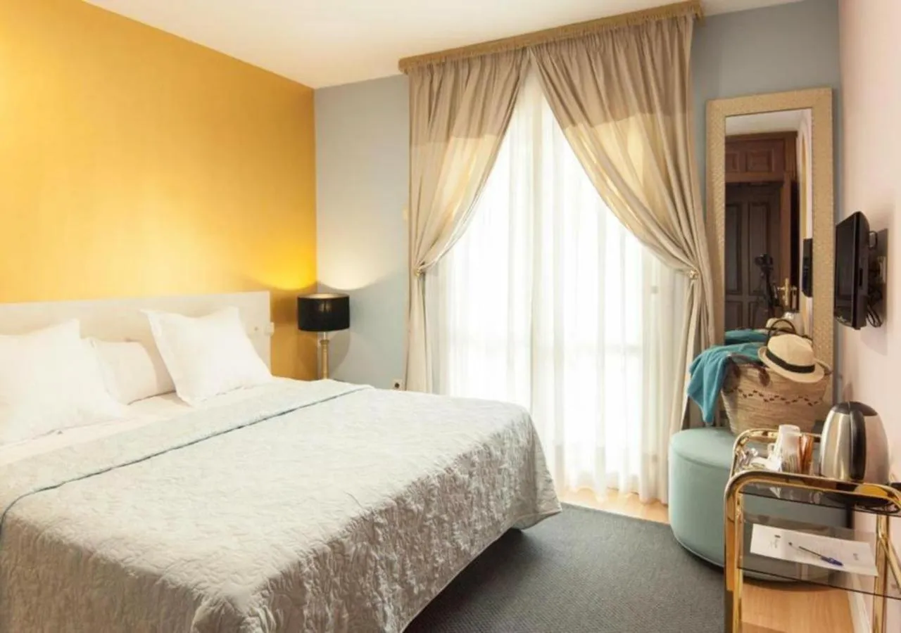 Photo of the whole room, Bed in Hotel Boutique Villa Lorena by Charming Stay Adults Recommended