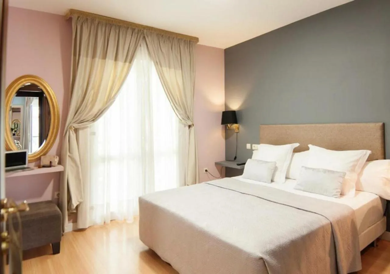 Photo of the whole room, Bed in Hotel Boutique Villa Lorena by Charming Stay Adults Recommended