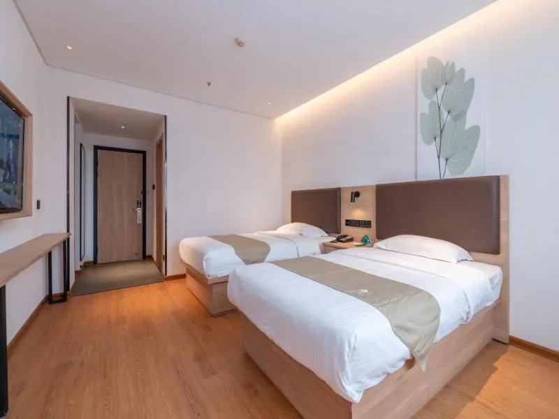 Bed in GreenTree Inn Ji‘nan Shanda Road Business Hotel