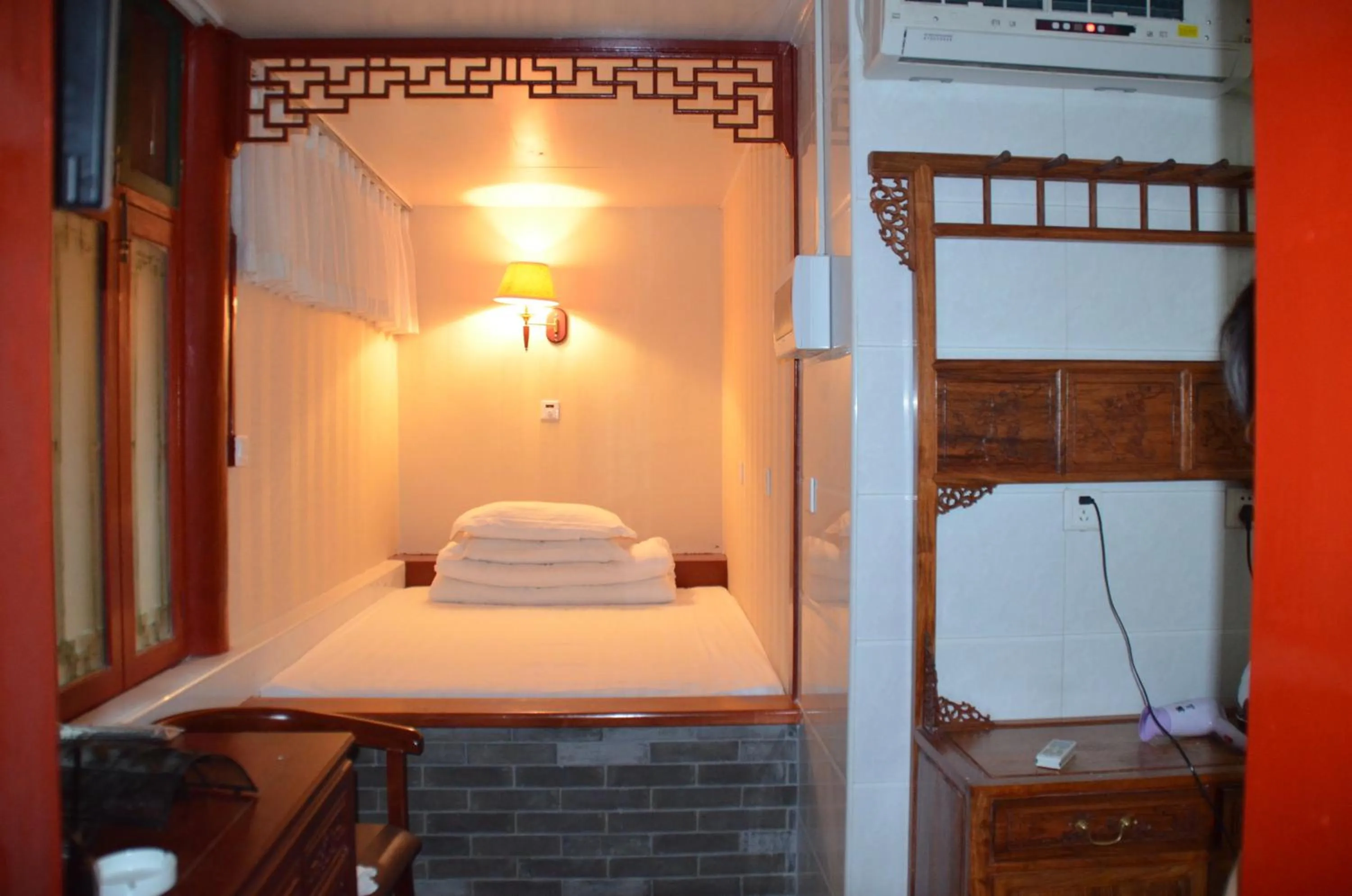 Bed in Qianmen Courtyard Hotel