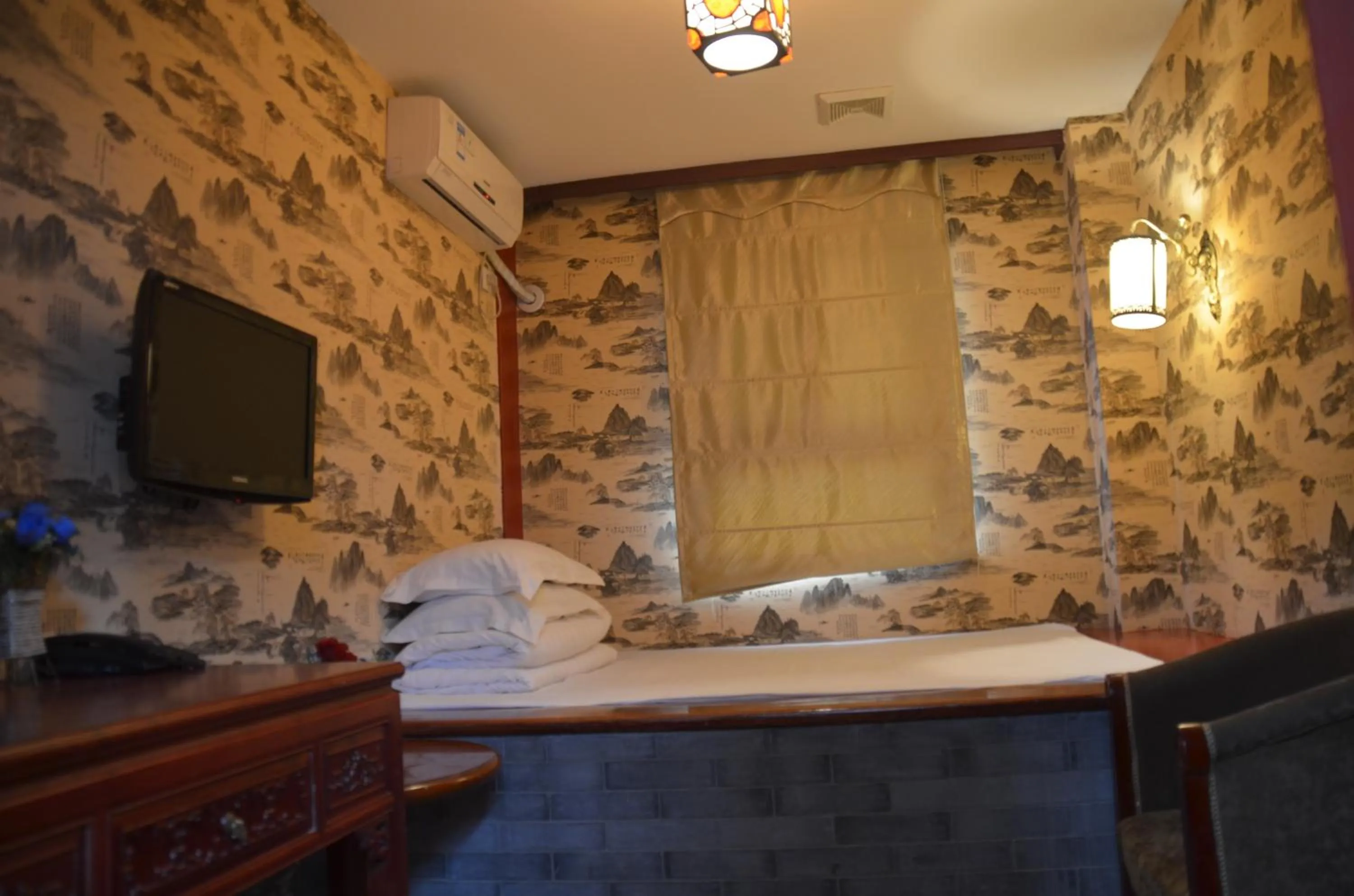 Bed in Qianmen Courtyard Hotel