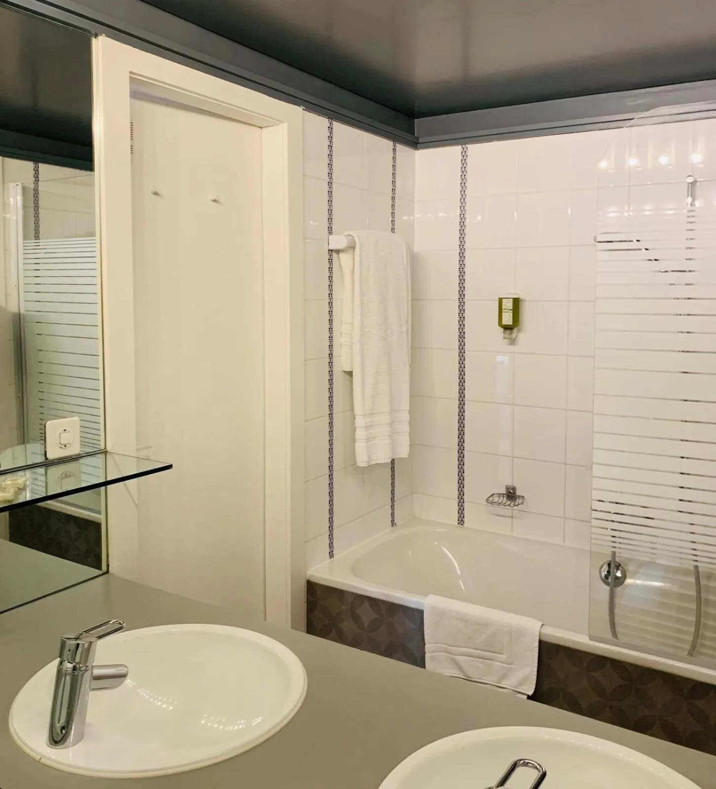 Bathroom in L'Hôtel by Hostellerie du Château