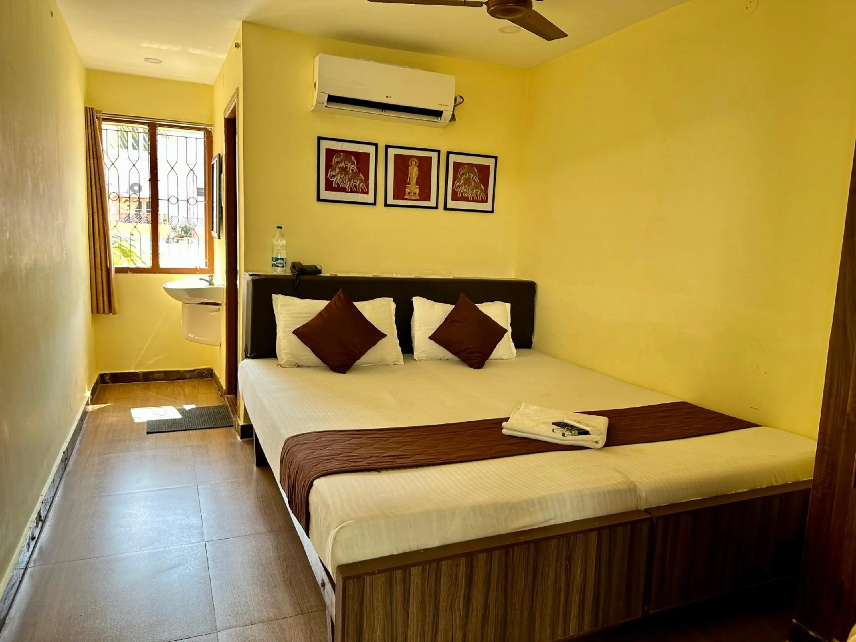 Photo of the whole room, Bed in Hotel Ramakrishna