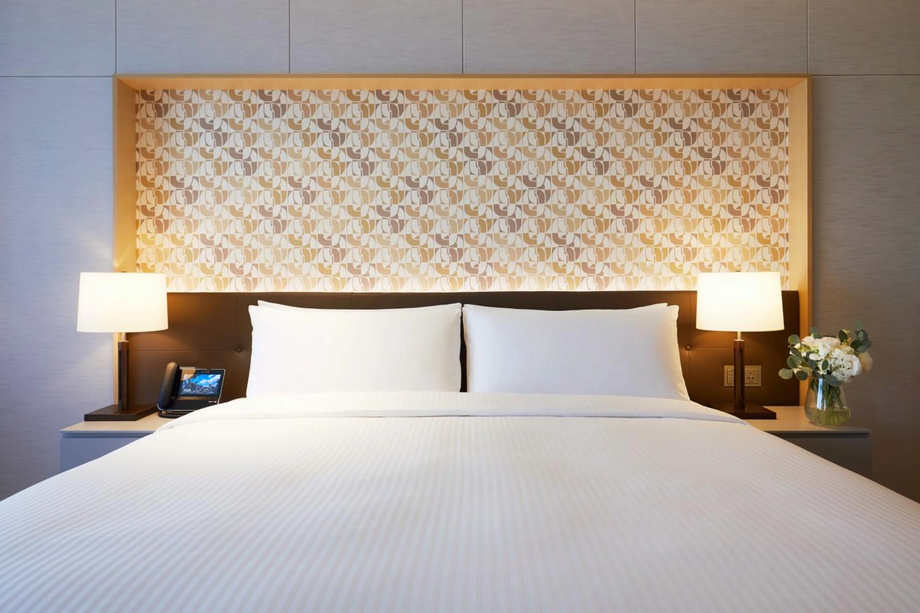 Bed in Shinhwa Jeju Shinhwa World Hotels
