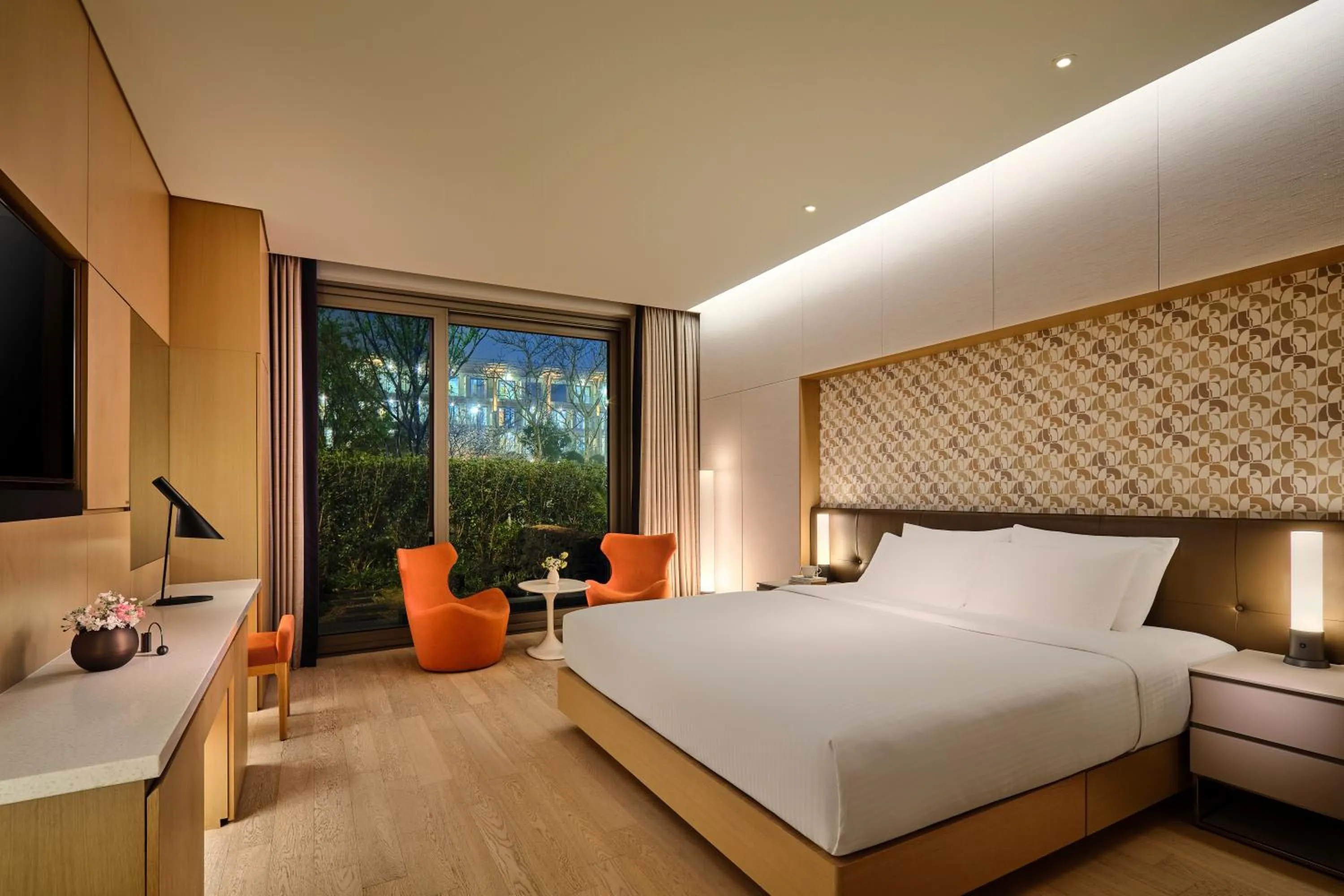 Bed in Shinhwa Jeju Shinhwa World Hotels