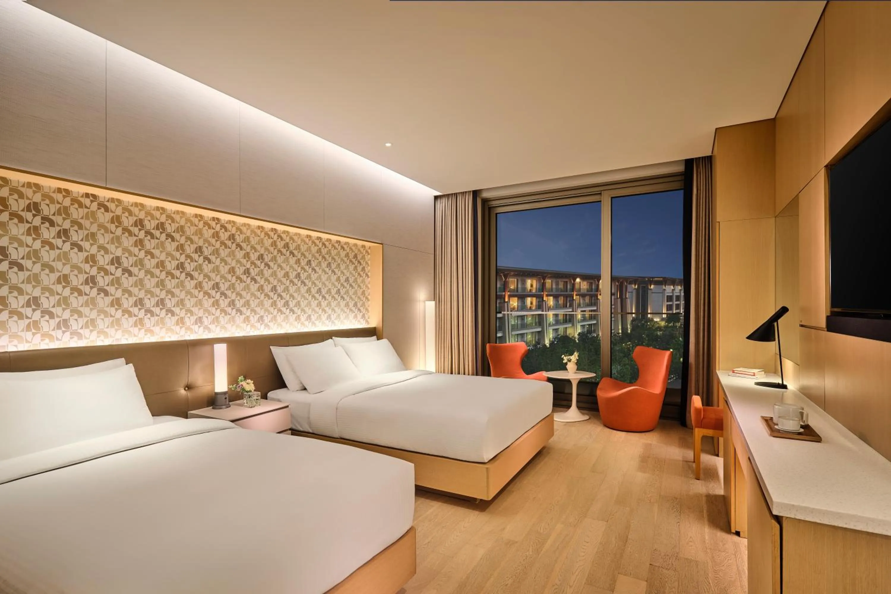 Bed in Shinhwa Jeju Shinhwa World Hotels
