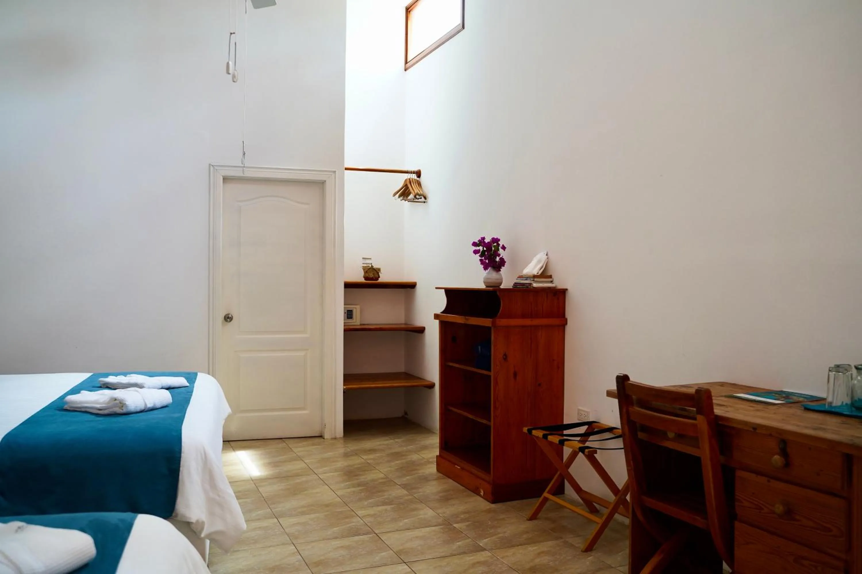 Photo of the whole room, Bed in Hotel Albemarle Galapagos Beachfront