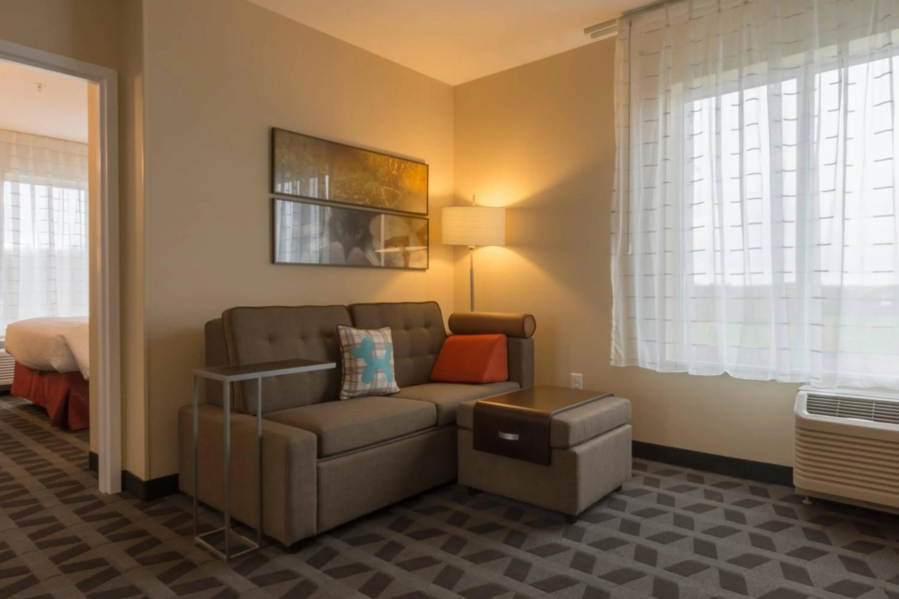 Living room in TownePlace Suites by Marriott Syracuse Clay