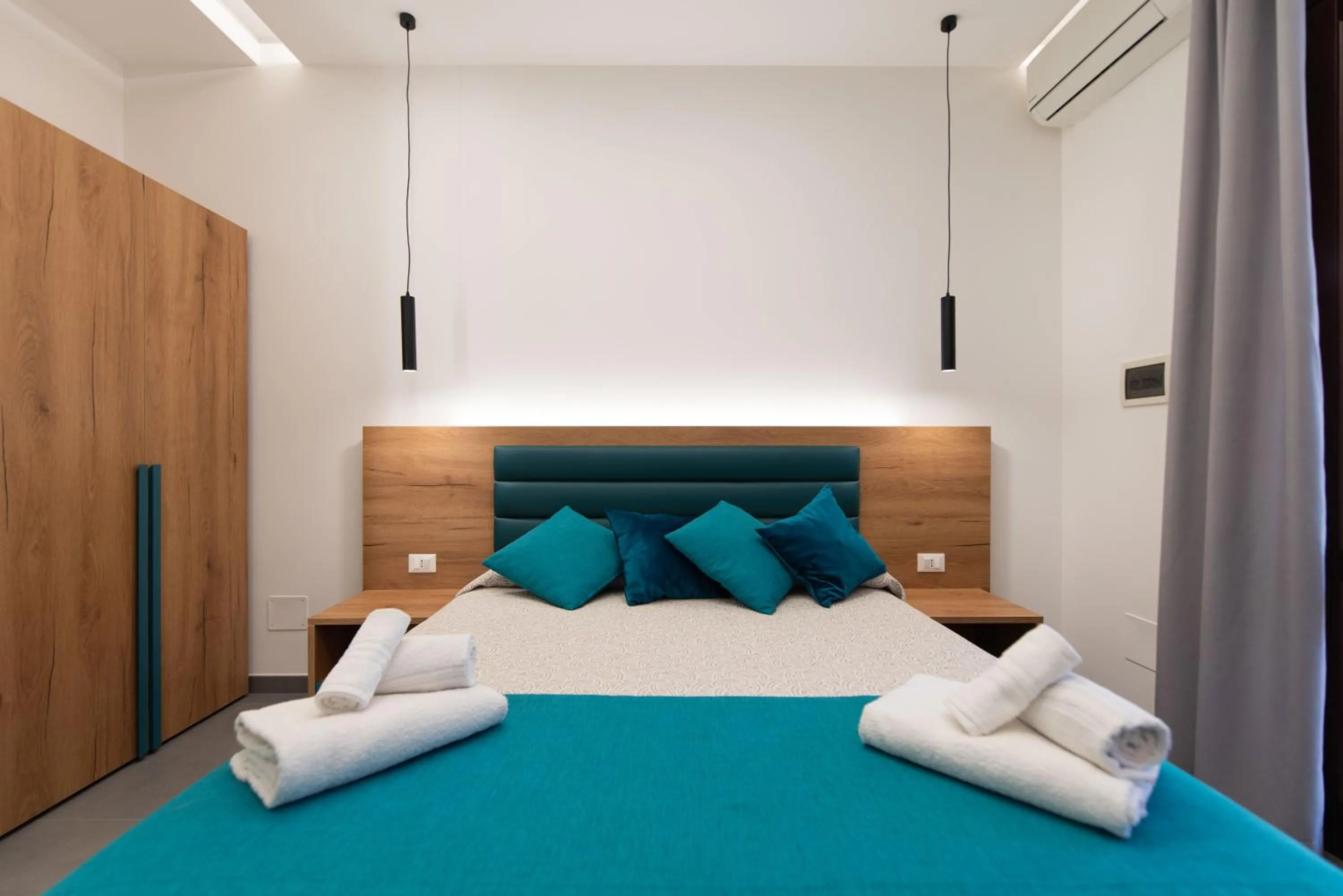 Decorative detail, Bed in Affittacamere Aloe