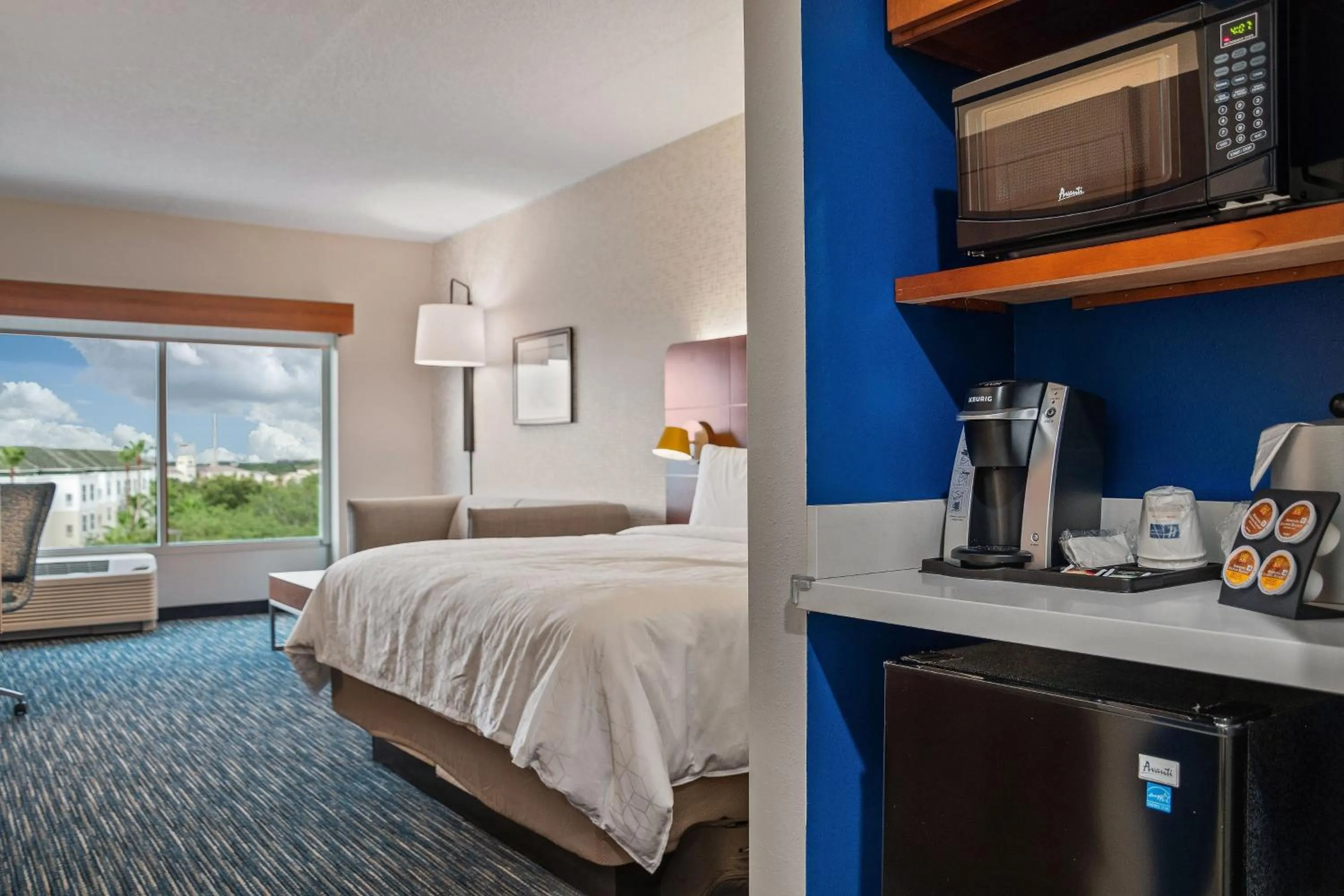 Photo of the whole room, Bed in Holiday Inn Express & Suites Orlando- Lake Buena Vista by IHG