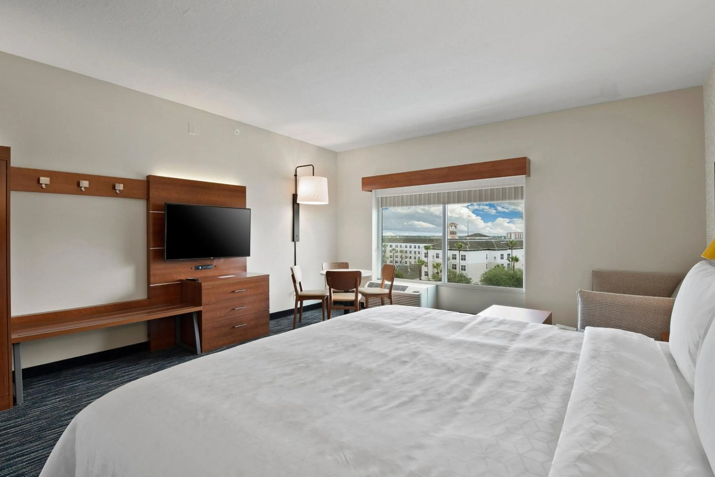 Photo of the whole room, Bed in Holiday Inn Express & Suites Orlando- Lake Buena Vista by IHG