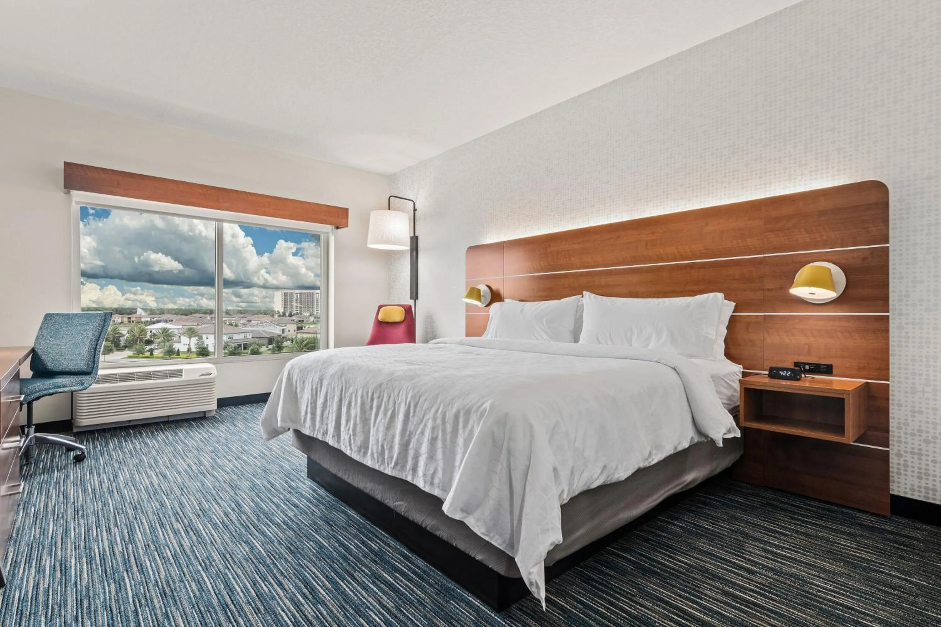 Photo of the whole room, Bed in Holiday Inn Express & Suites Orlando- Lake Buena Vista by IHG