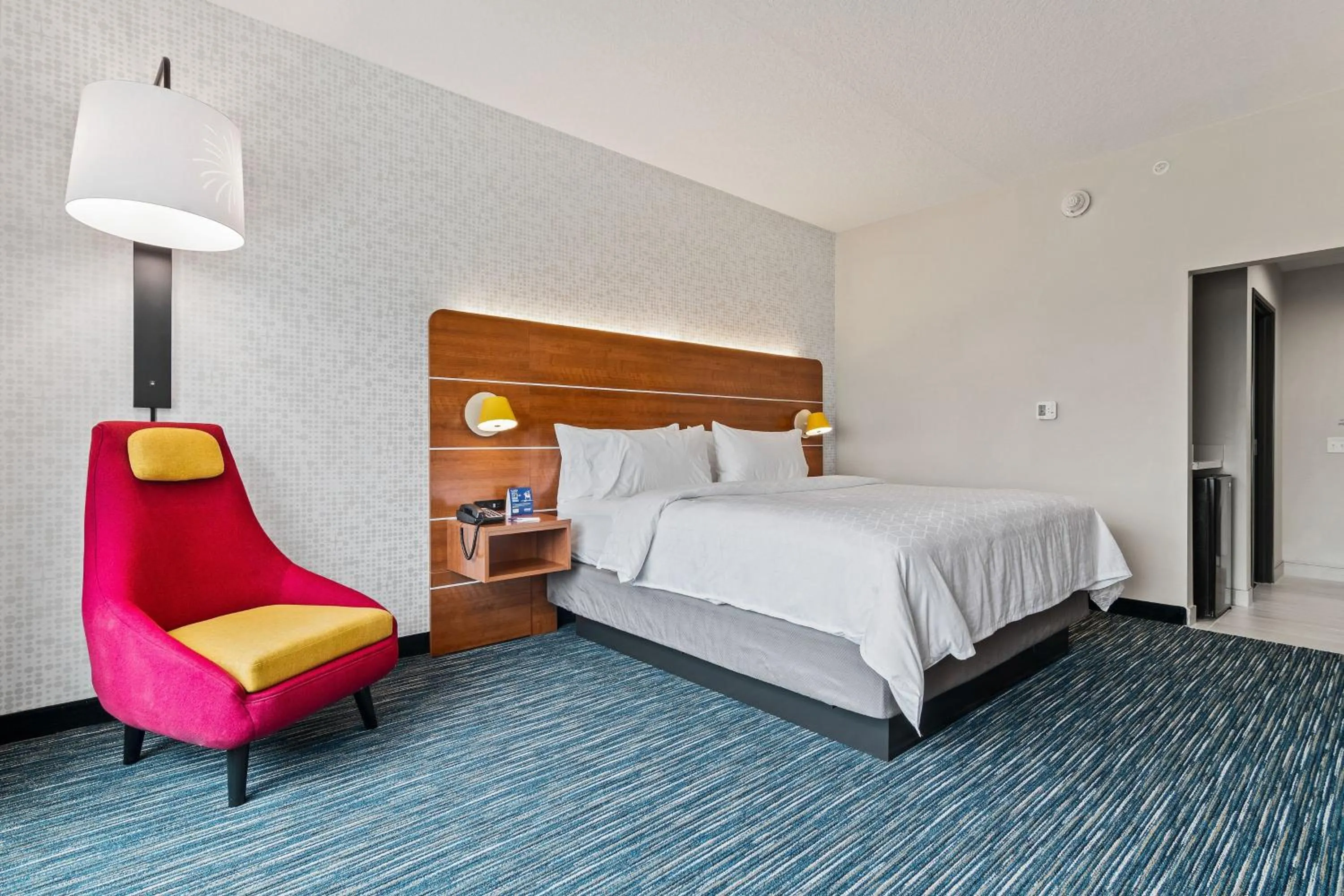 Photo of the whole room, Bed in Holiday Inn Express & Suites Orlando- Lake Buena Vista by IHG