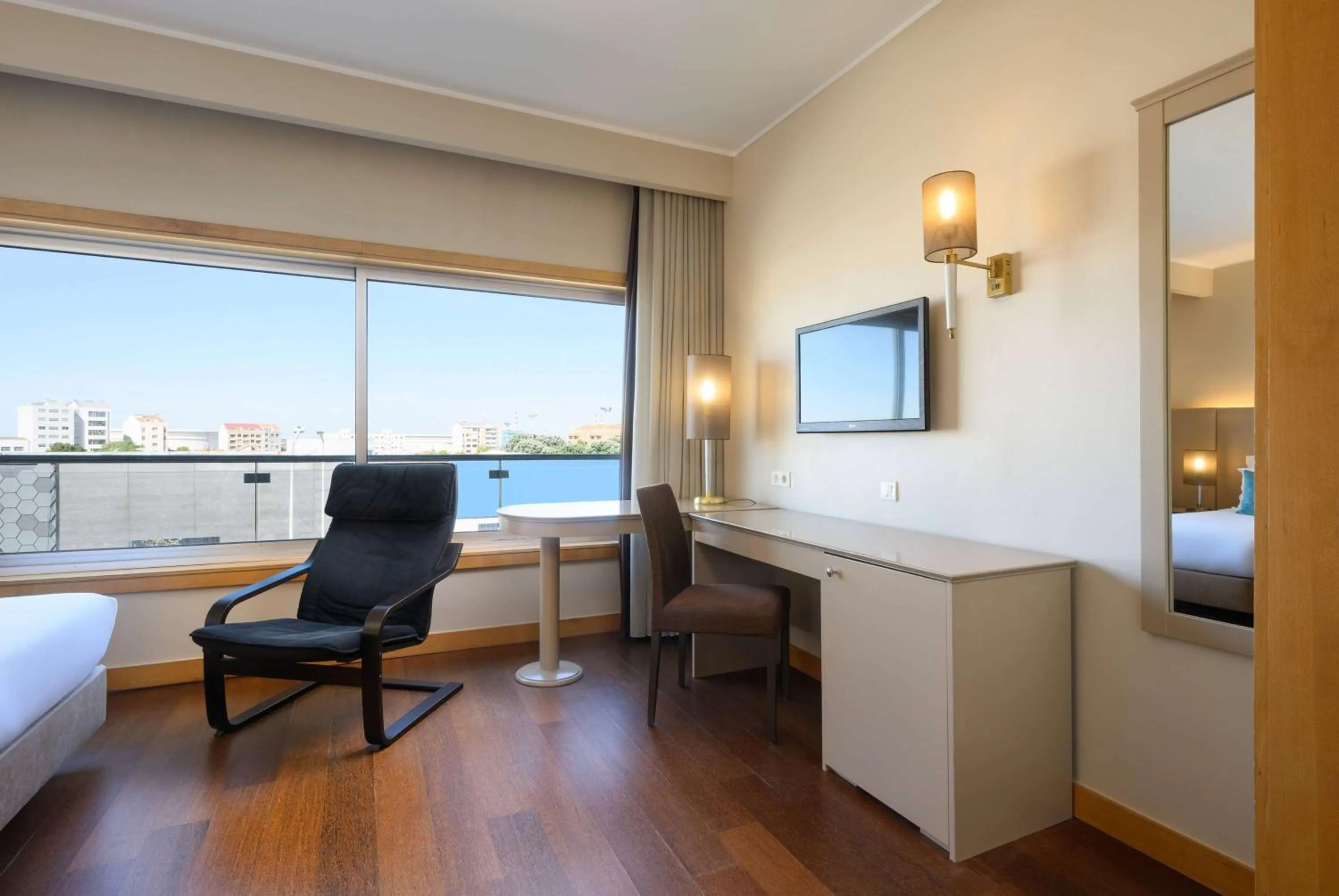 Photo of the whole room, Bed in TRYP by Wyndham Porto Expo Hotel