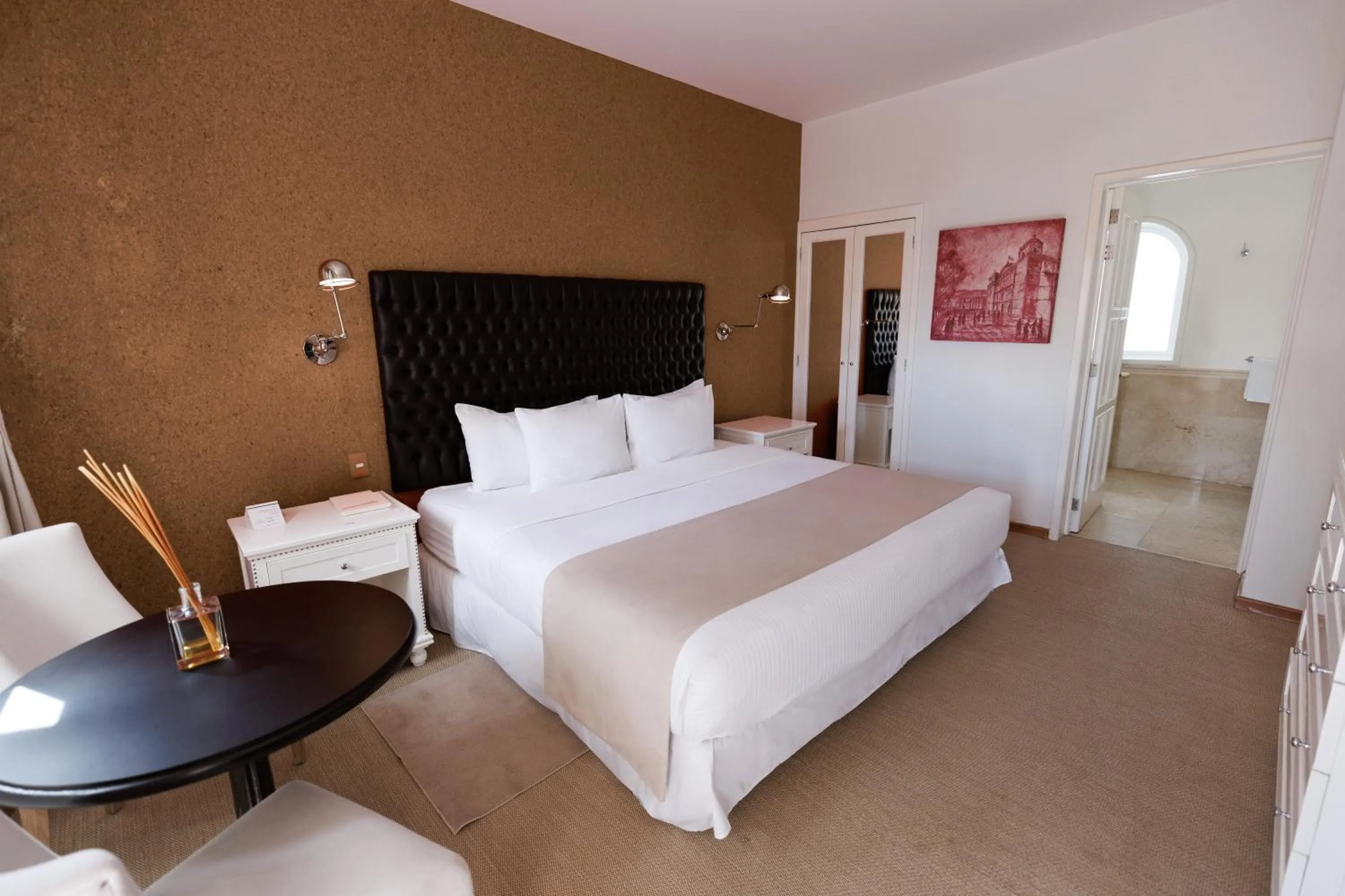 Bed in Casa Bonita Hotel & Luxury Residence