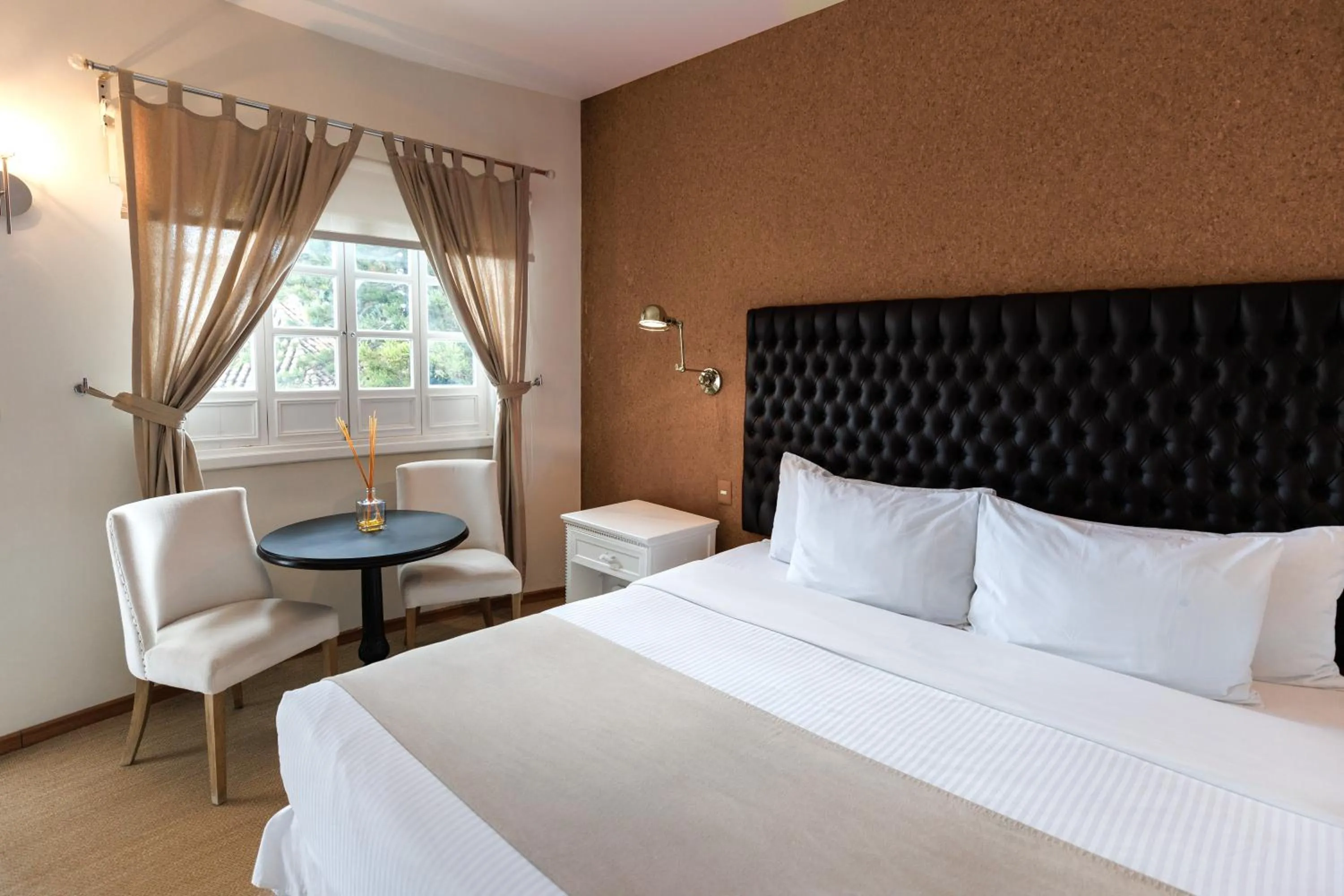 Bed in Casa Bonita Hotel & Luxury Residence