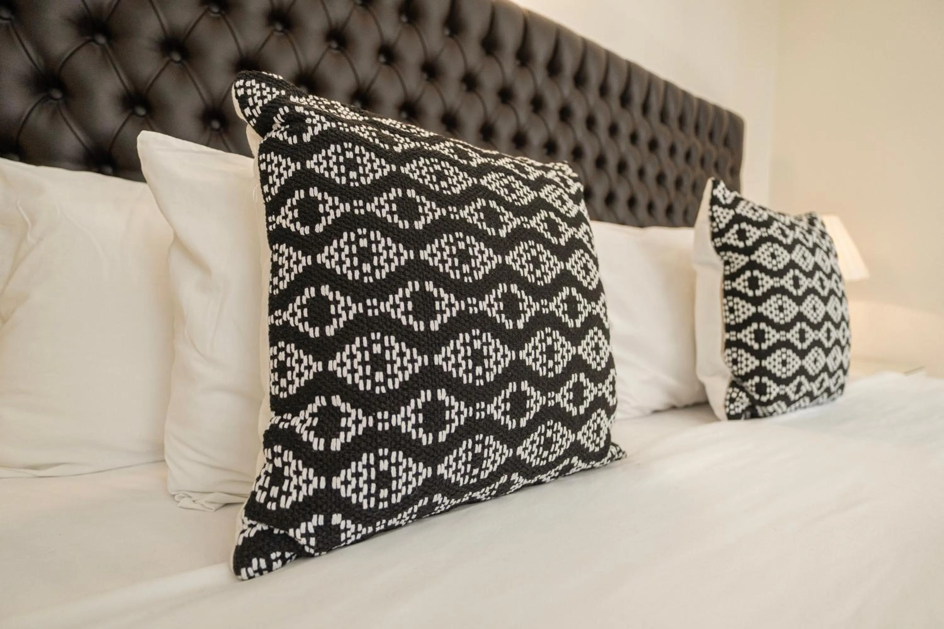 Bed in Casa Bonita Hotel & Luxury Residence