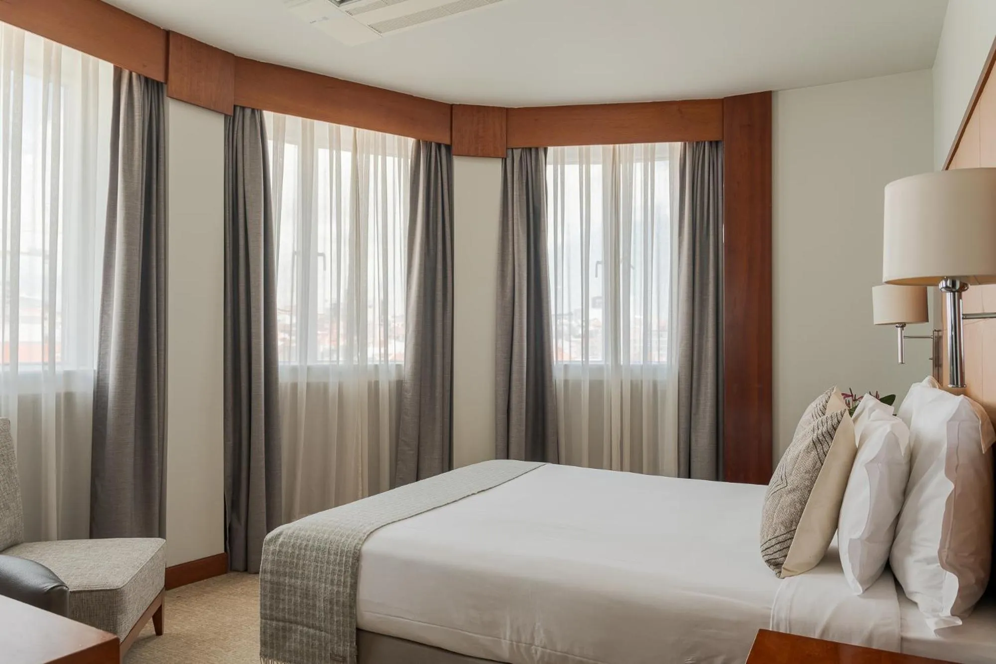 Bed in Hotel Dom Carlos Liberty