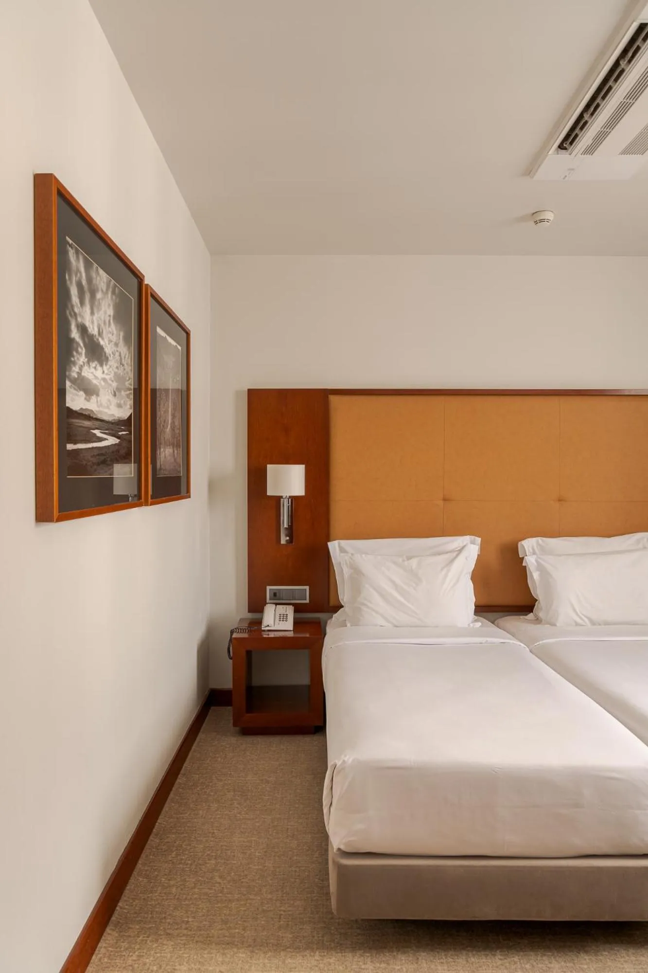 Bed in Hotel Dom Carlos Liberty