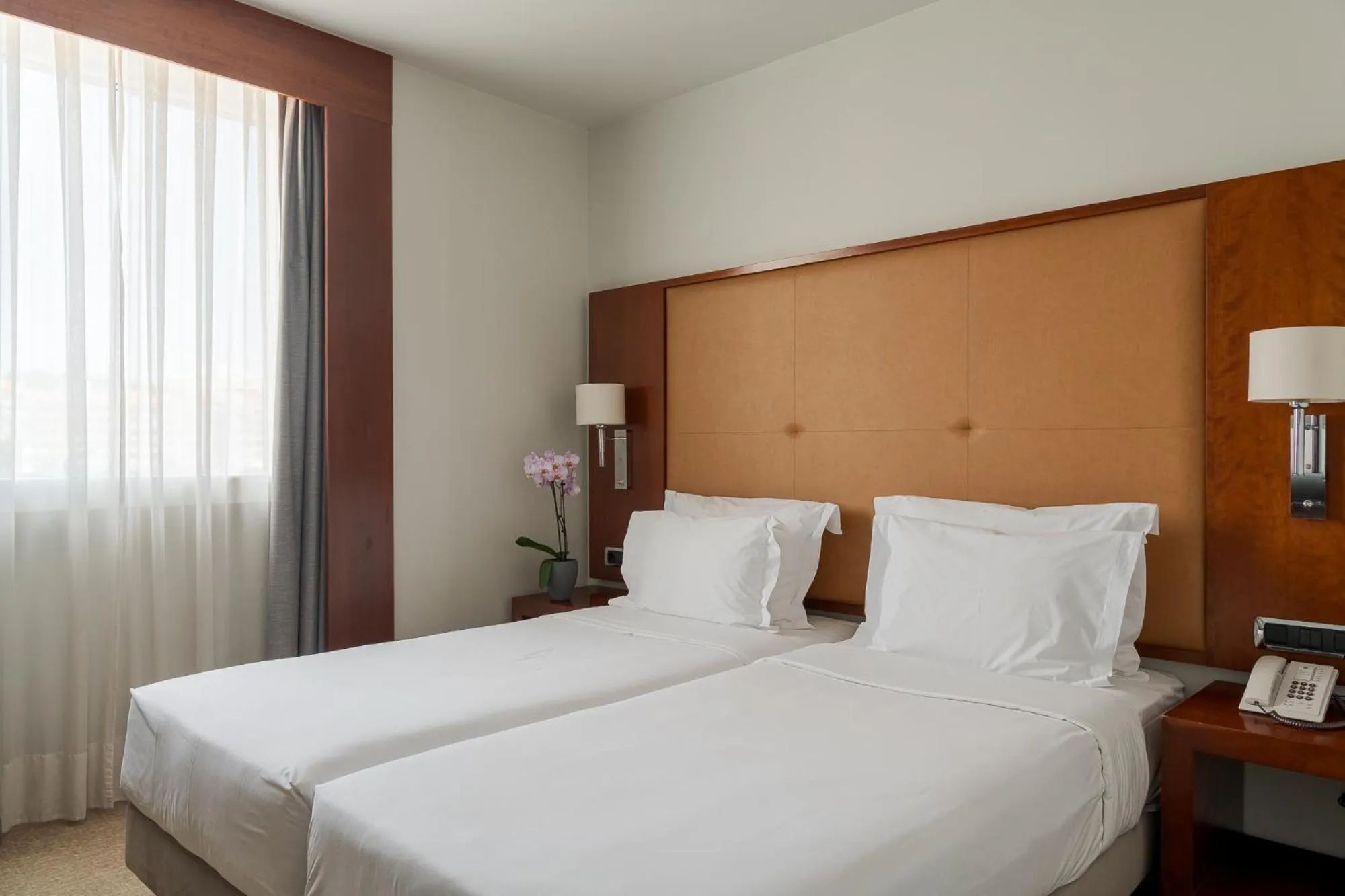 Bed in Hotel Dom Carlos Liberty