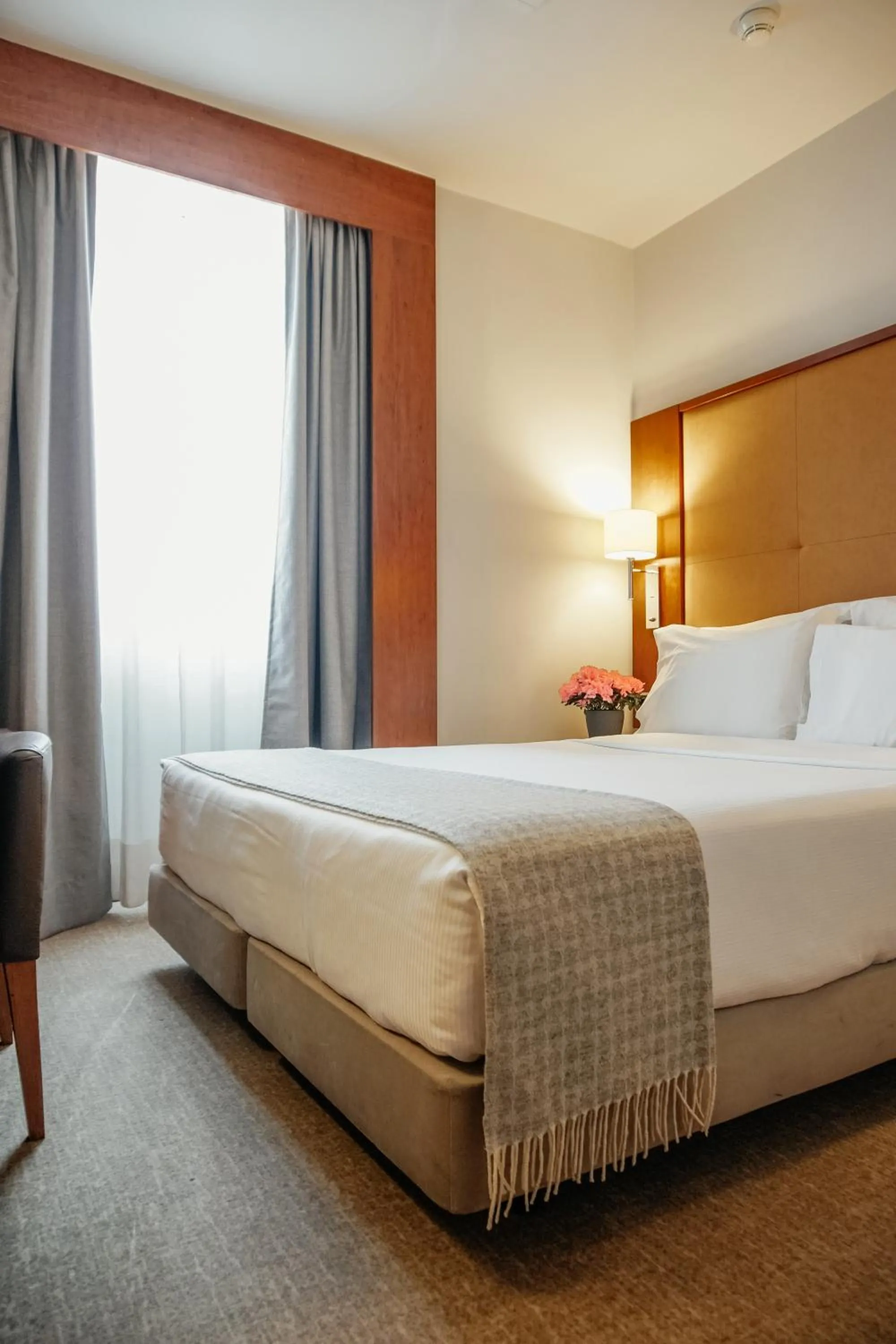 Bed in Hotel Dom Carlos Liberty