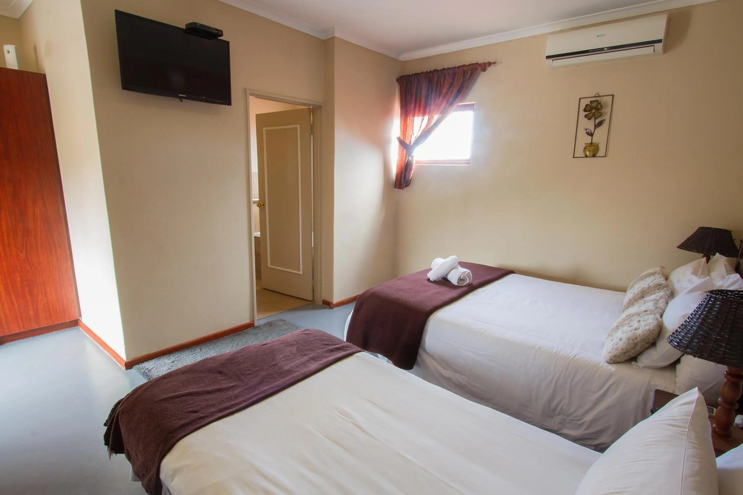 Photo of the whole room, Bed in Ramasibi Guest Services