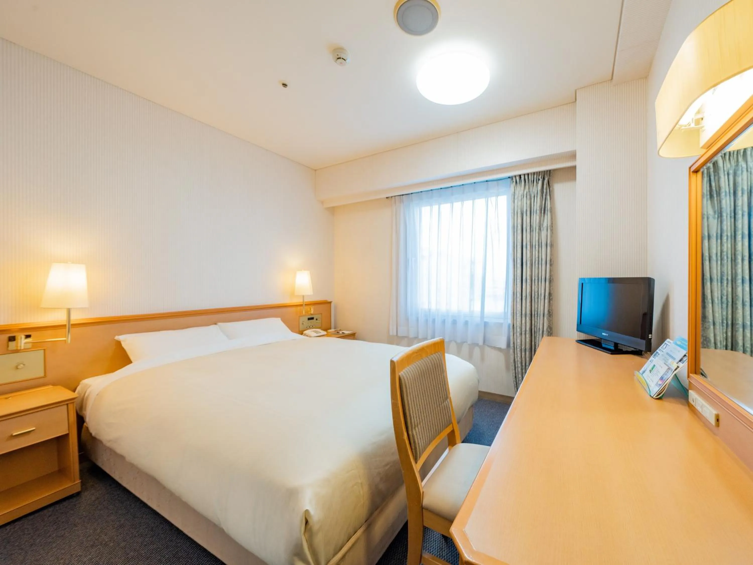 Photo of the whole room, Bed in Hotel Grand Terrace Obihiro
