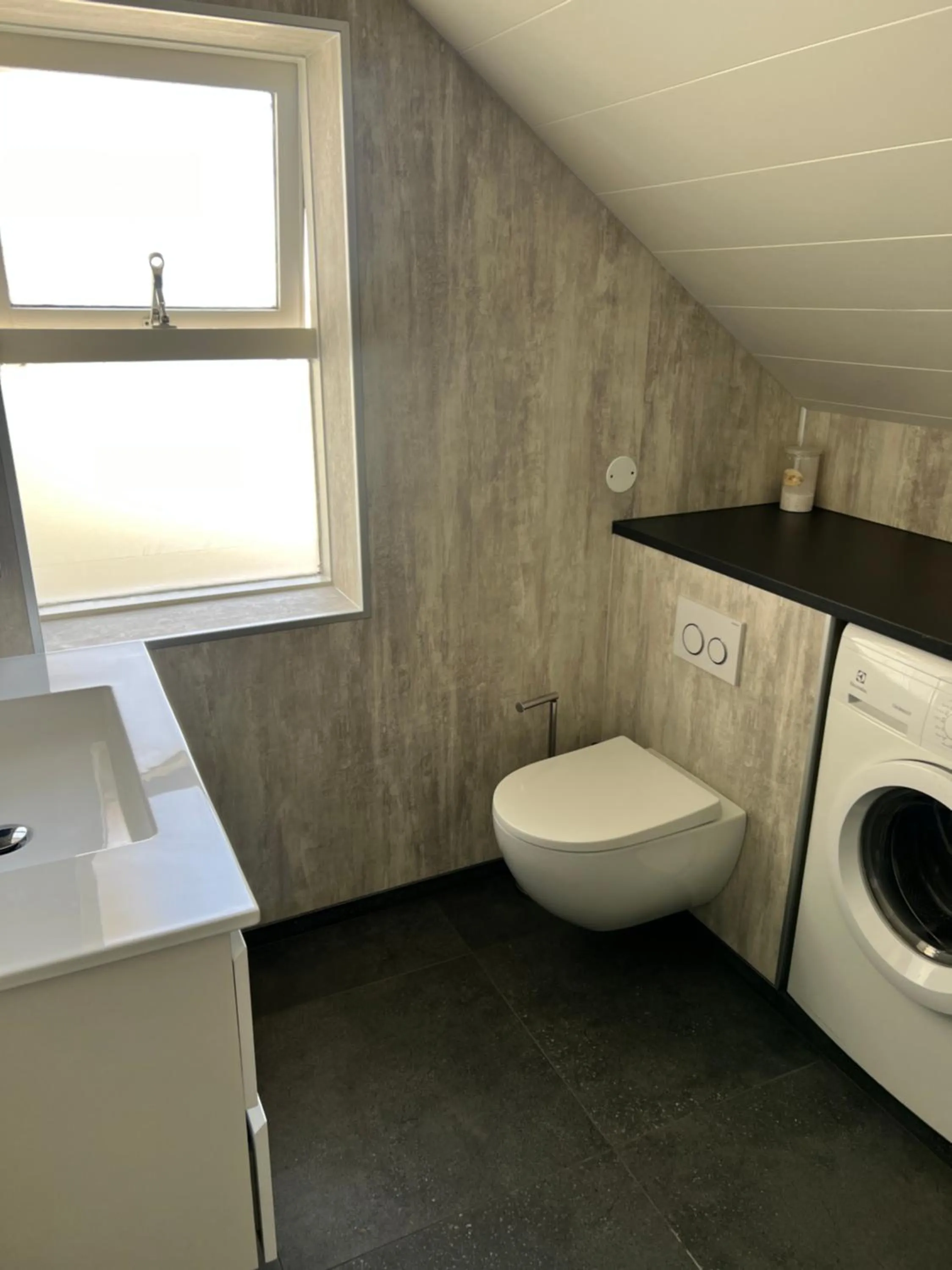 Toilet in Hvammur Apartments by the Harbour