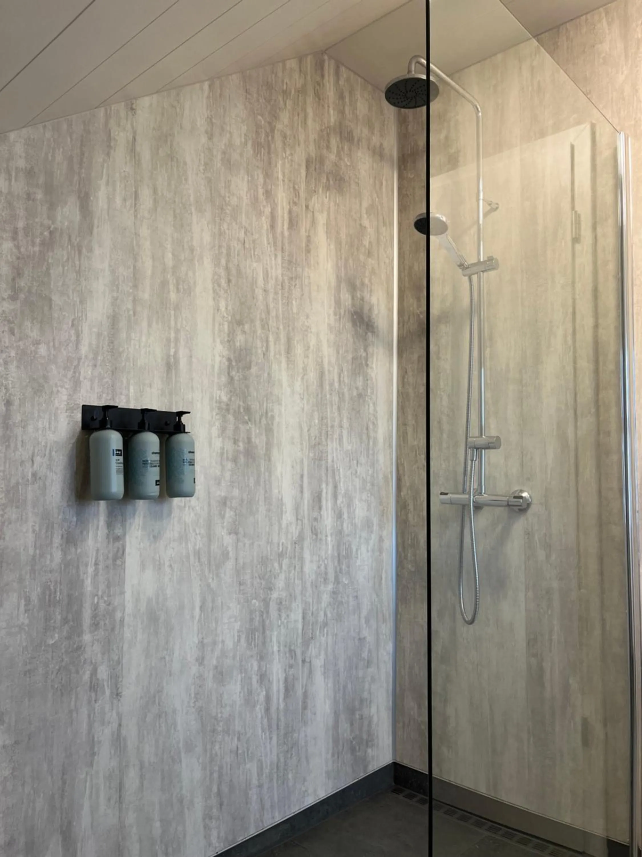 Shower in Hvammur Apartments by the Harbour