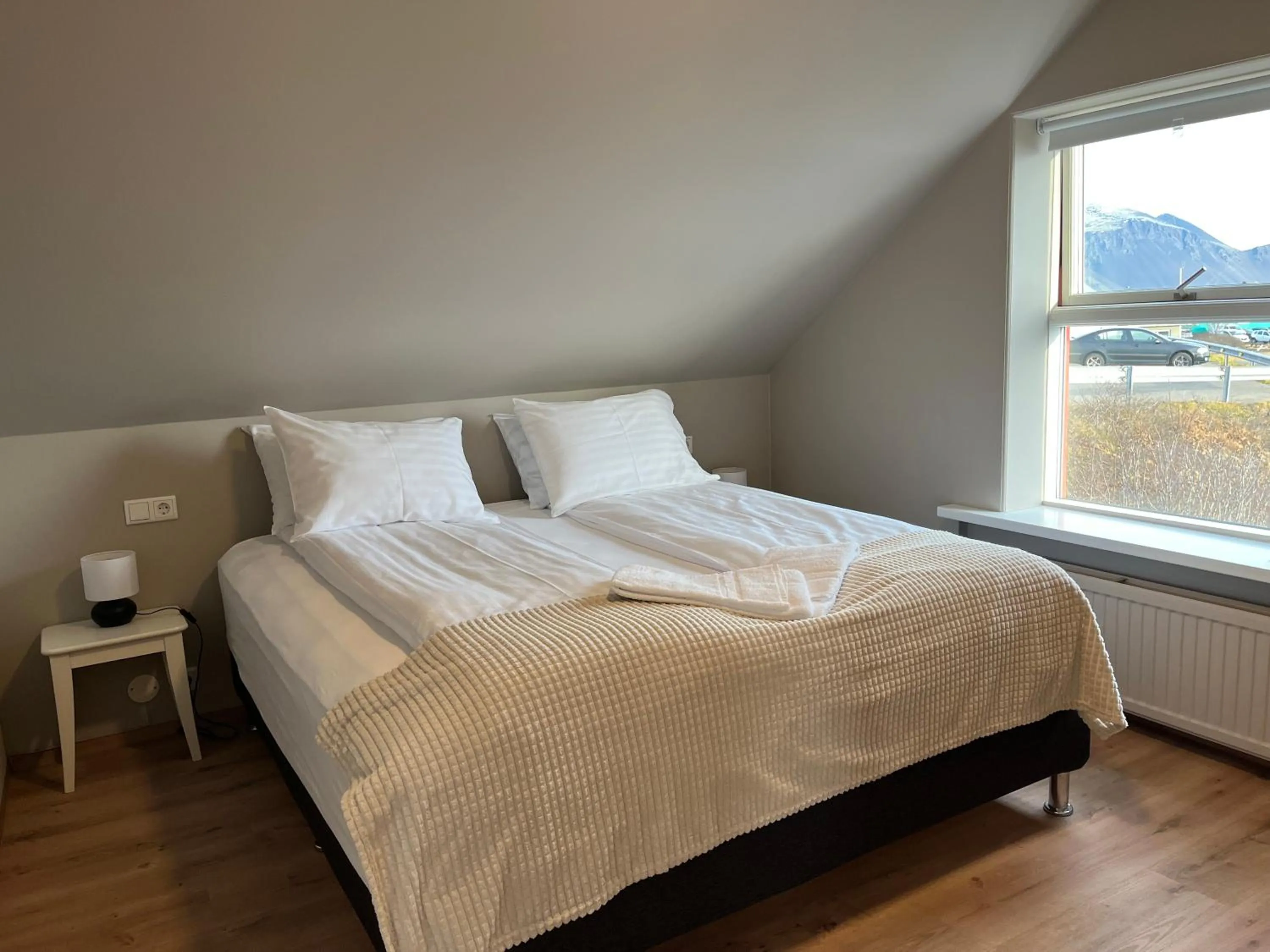 Bedroom, Bed in Hvammur Apartments by the Harbour