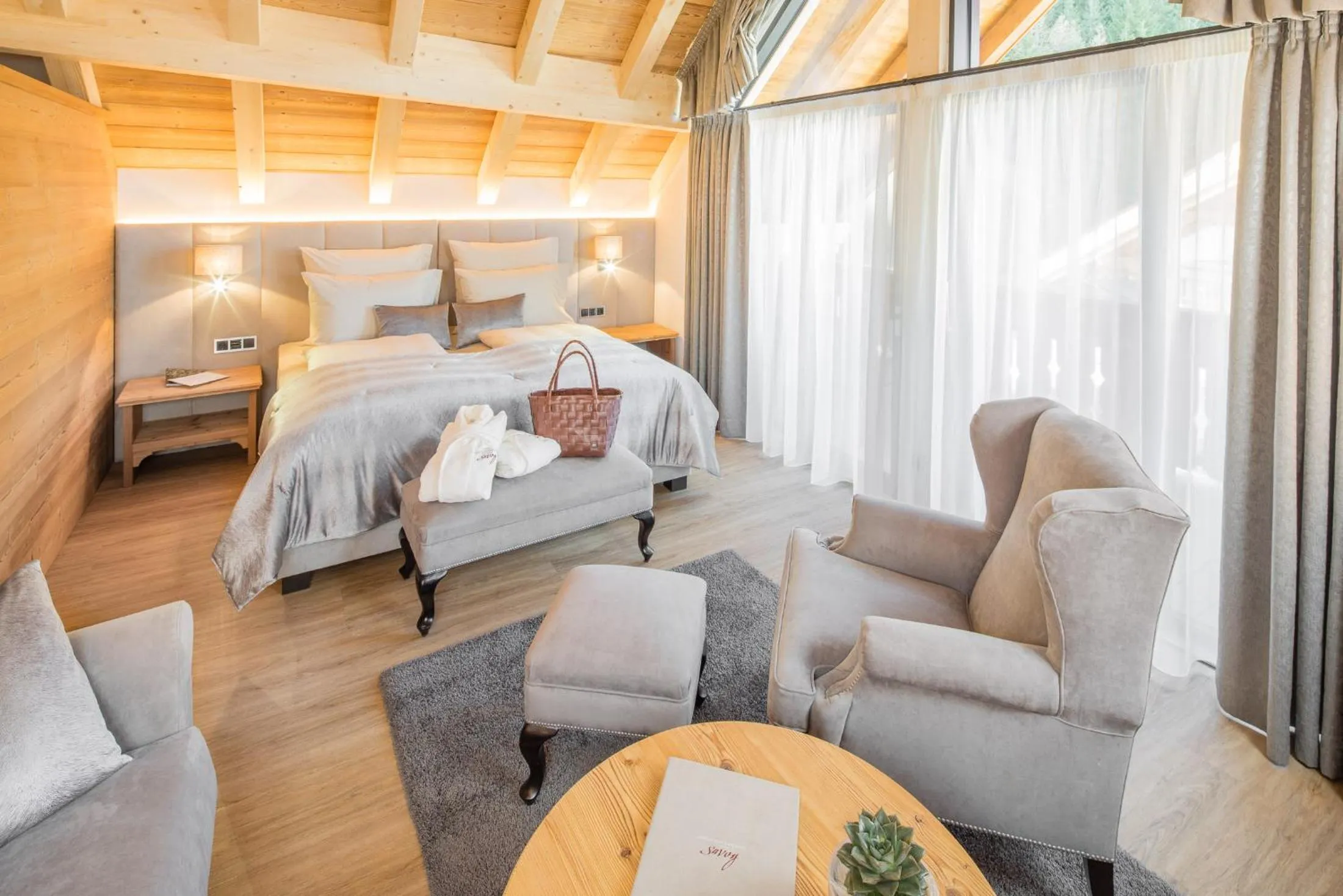 Photo of the whole room, Bed in Savoy Dolomites Luxury & Spa Hotel