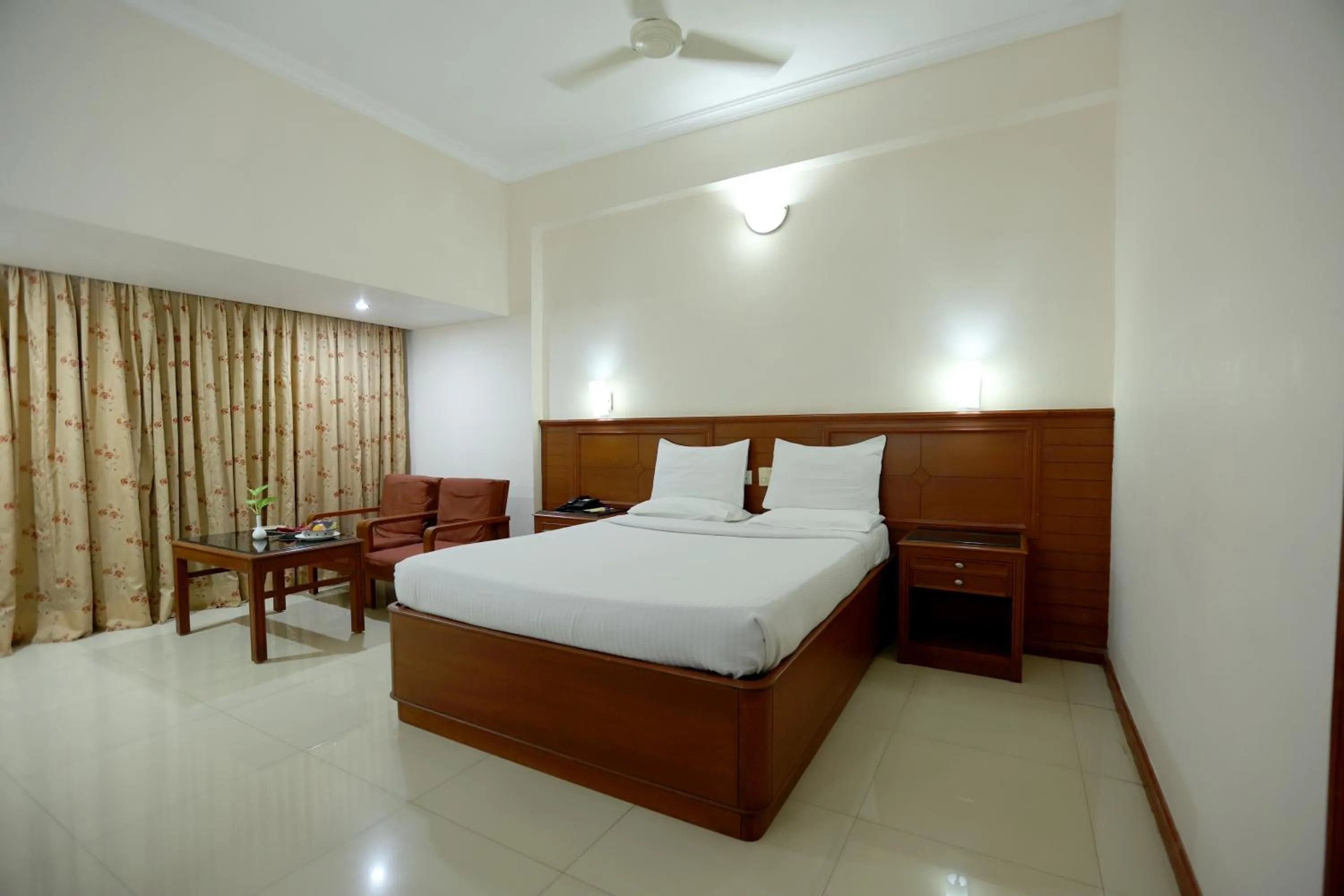 Bed in Breeze Residency