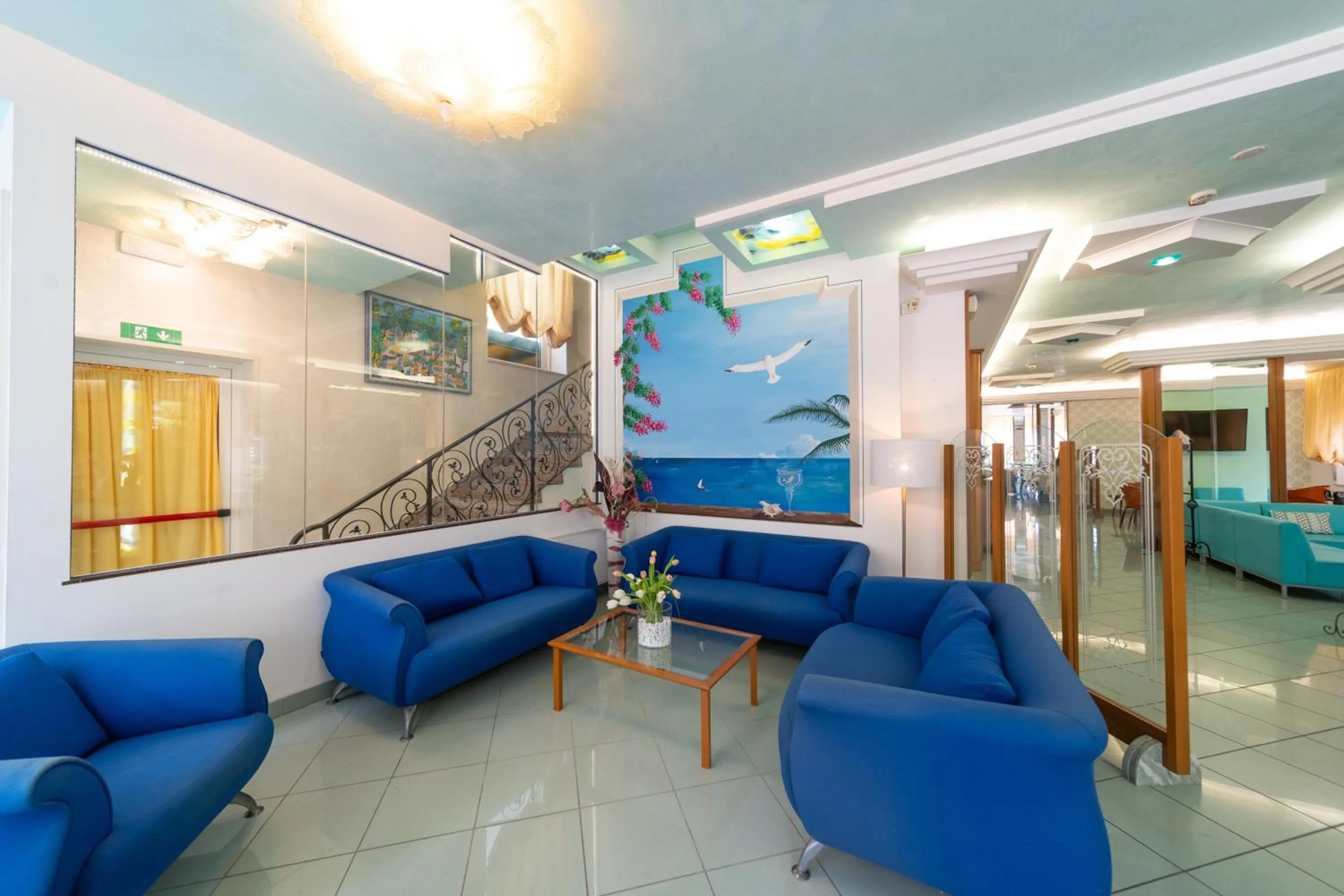 Communal lounge/ TV room in Hotel Ancora