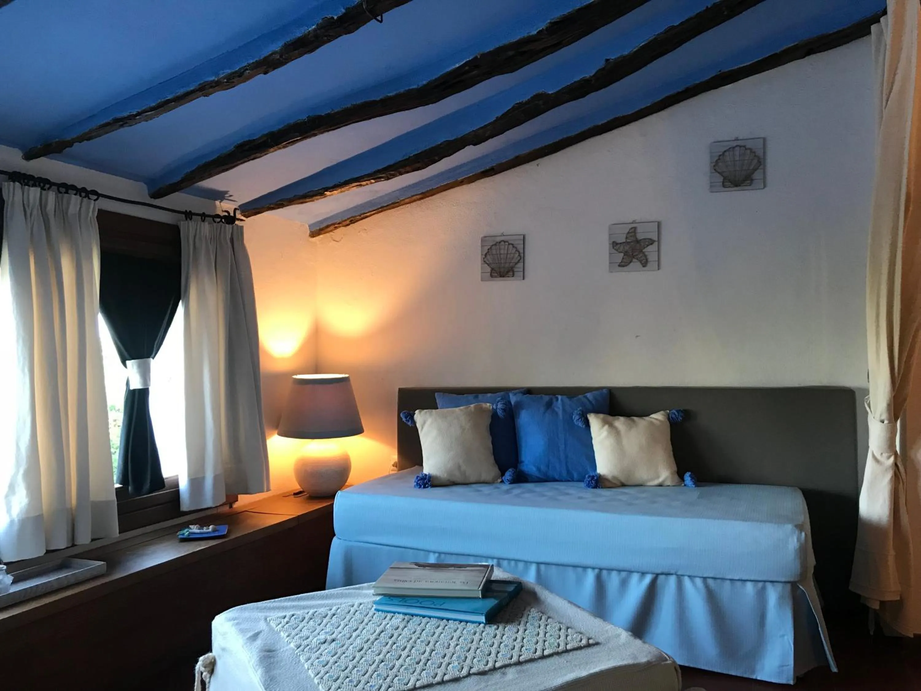 Bed in Palmasera Charming Suites