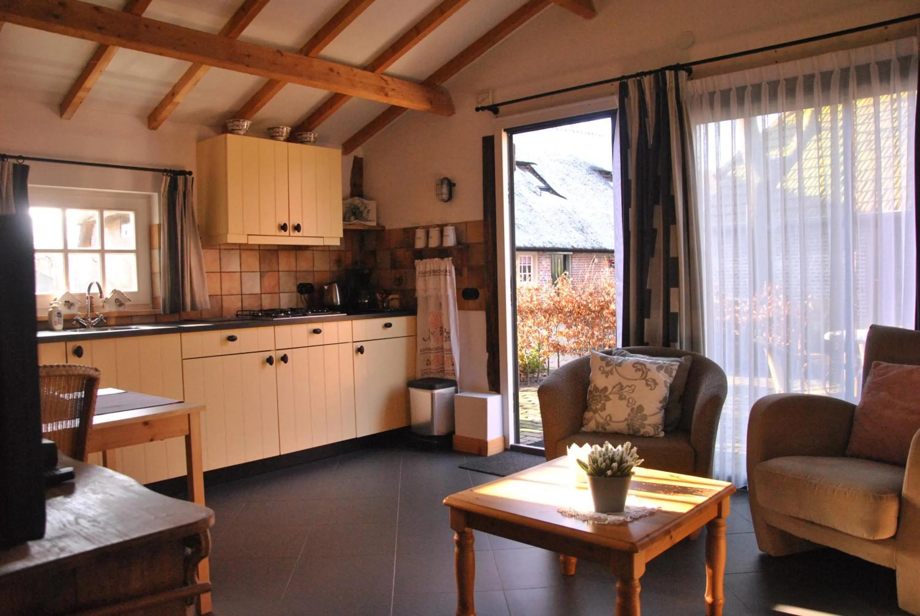 Kitchen or kitchenette in Erfgoed & Logies Den Heijkant