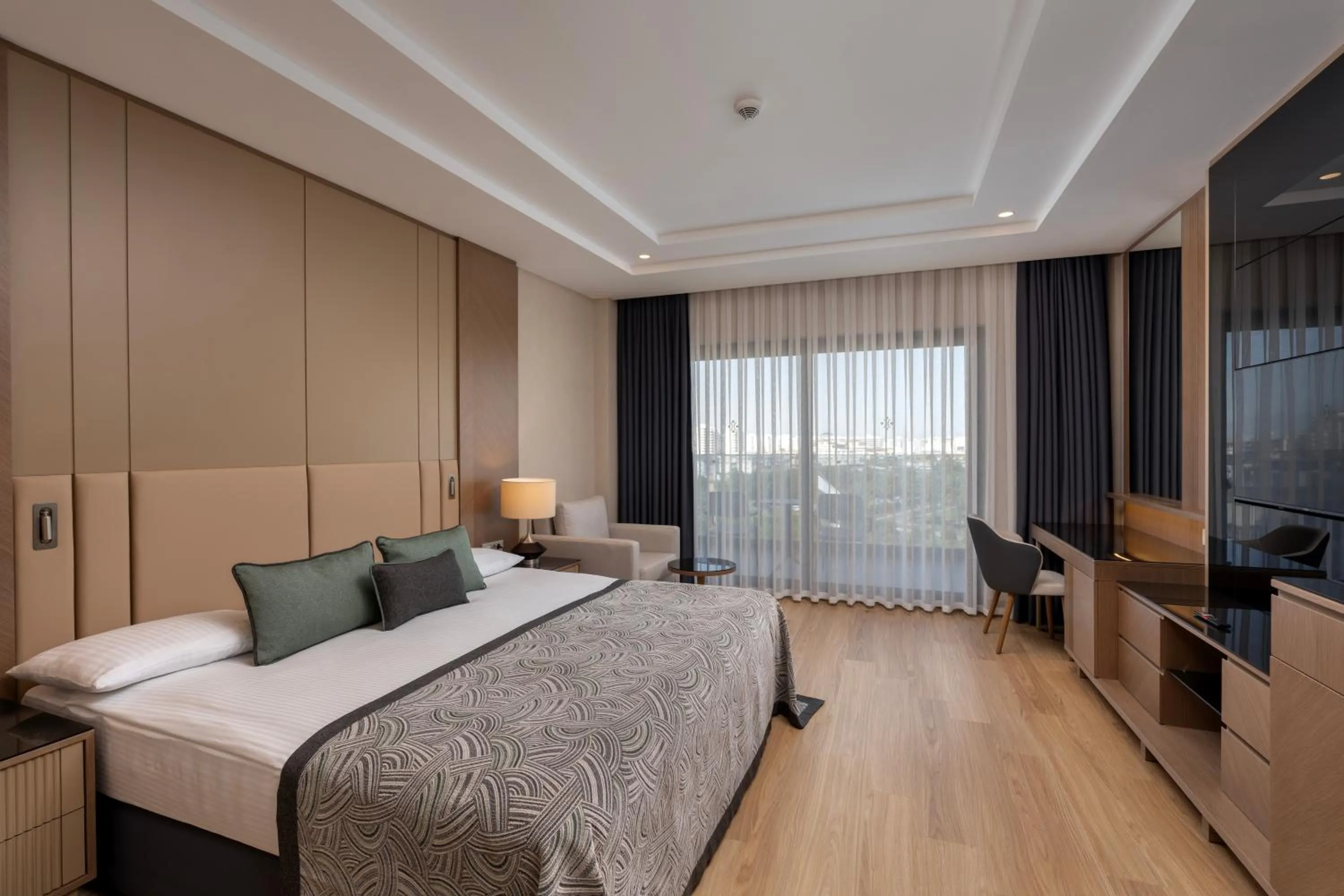 Bed in Miracle Resort Hotel