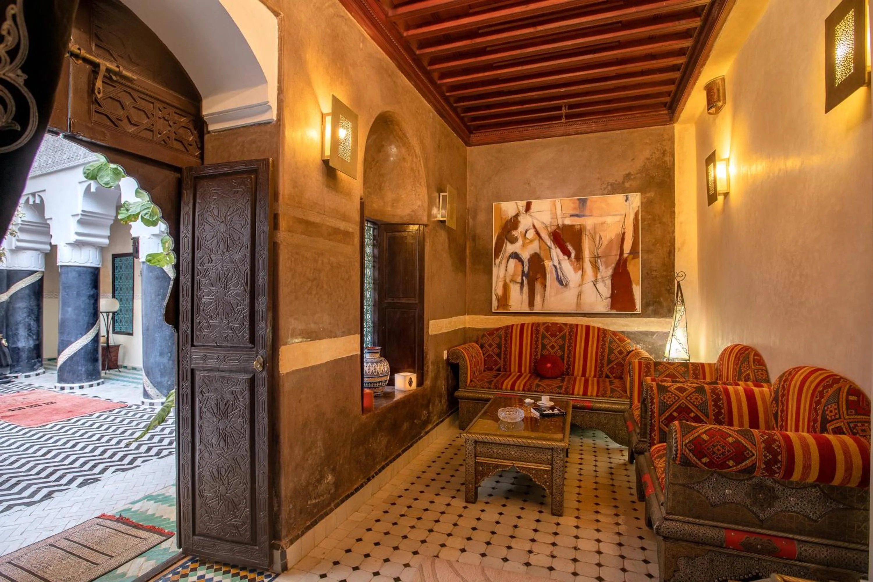 Communal lounge/ TV room in Riad Ben Tachfine