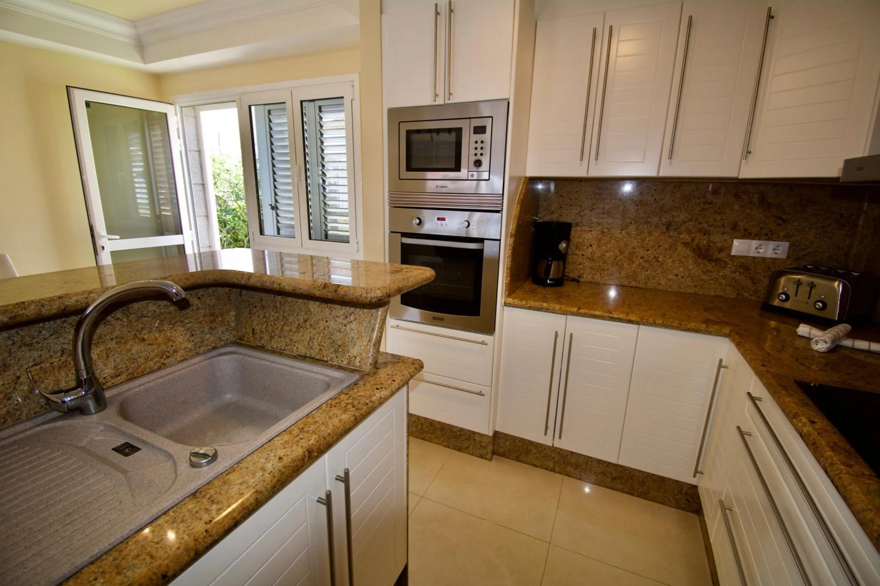 Kitchen or kitchenette in Villa Lovisi