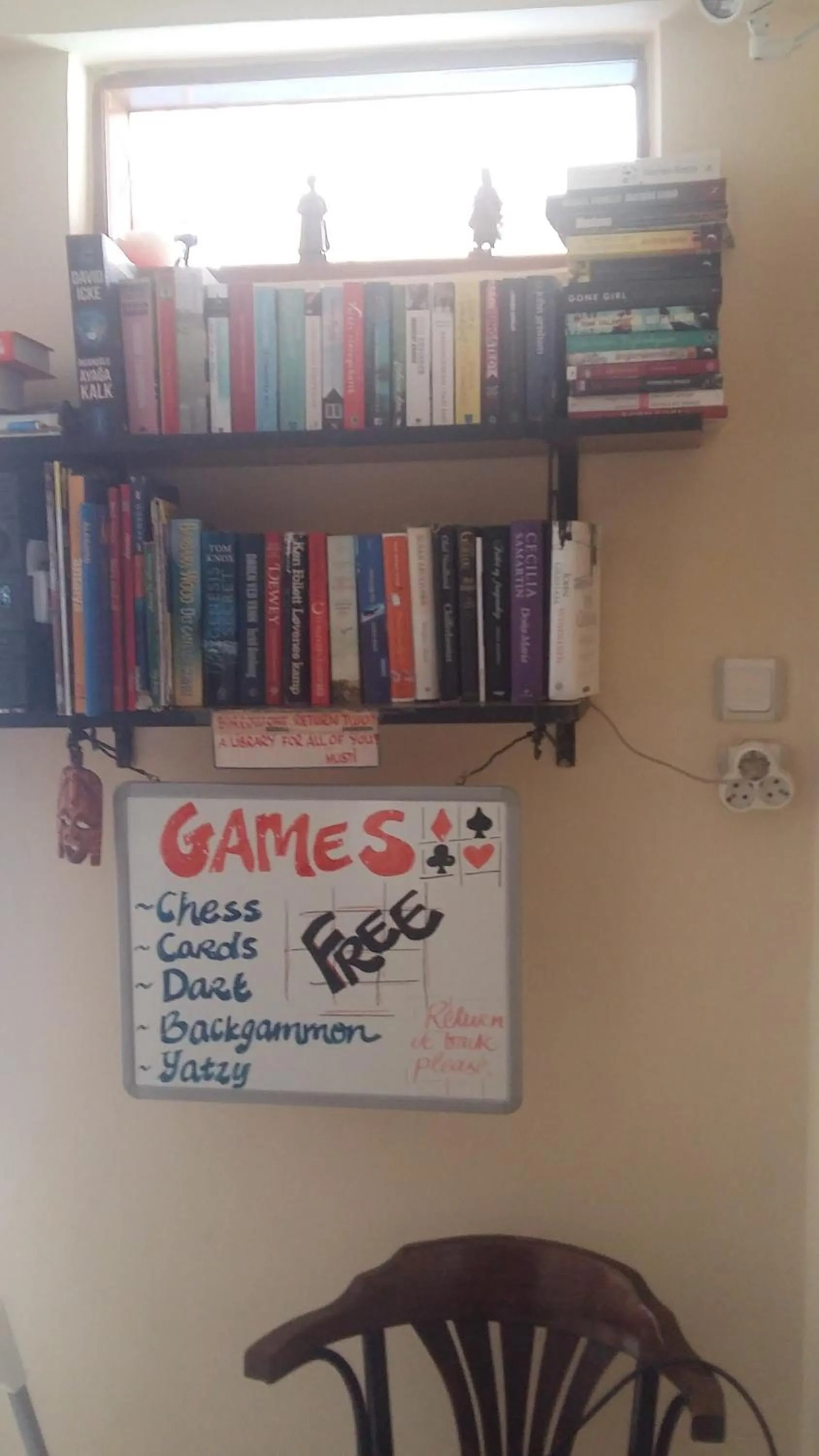 Library in Musti Apart Hotel