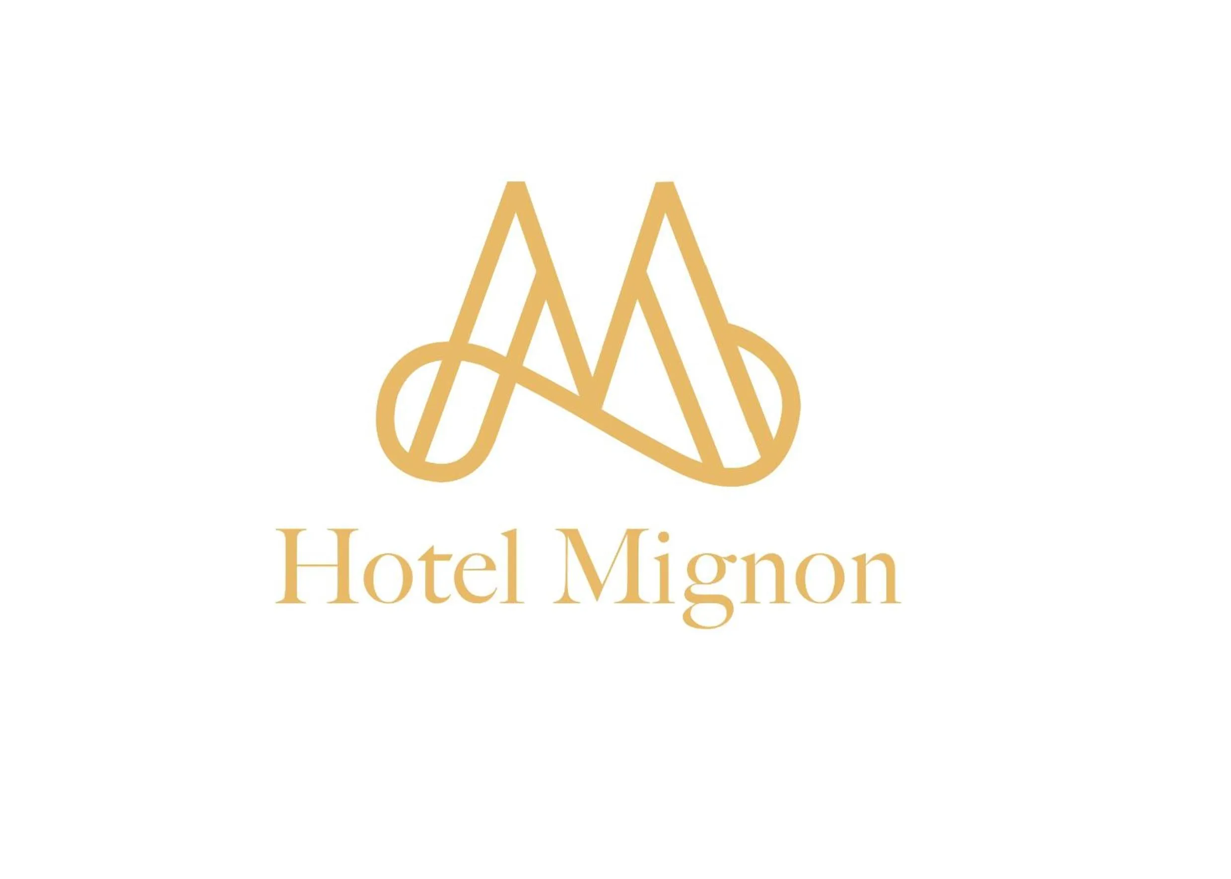 Property logo or sign in Hotel Mignon