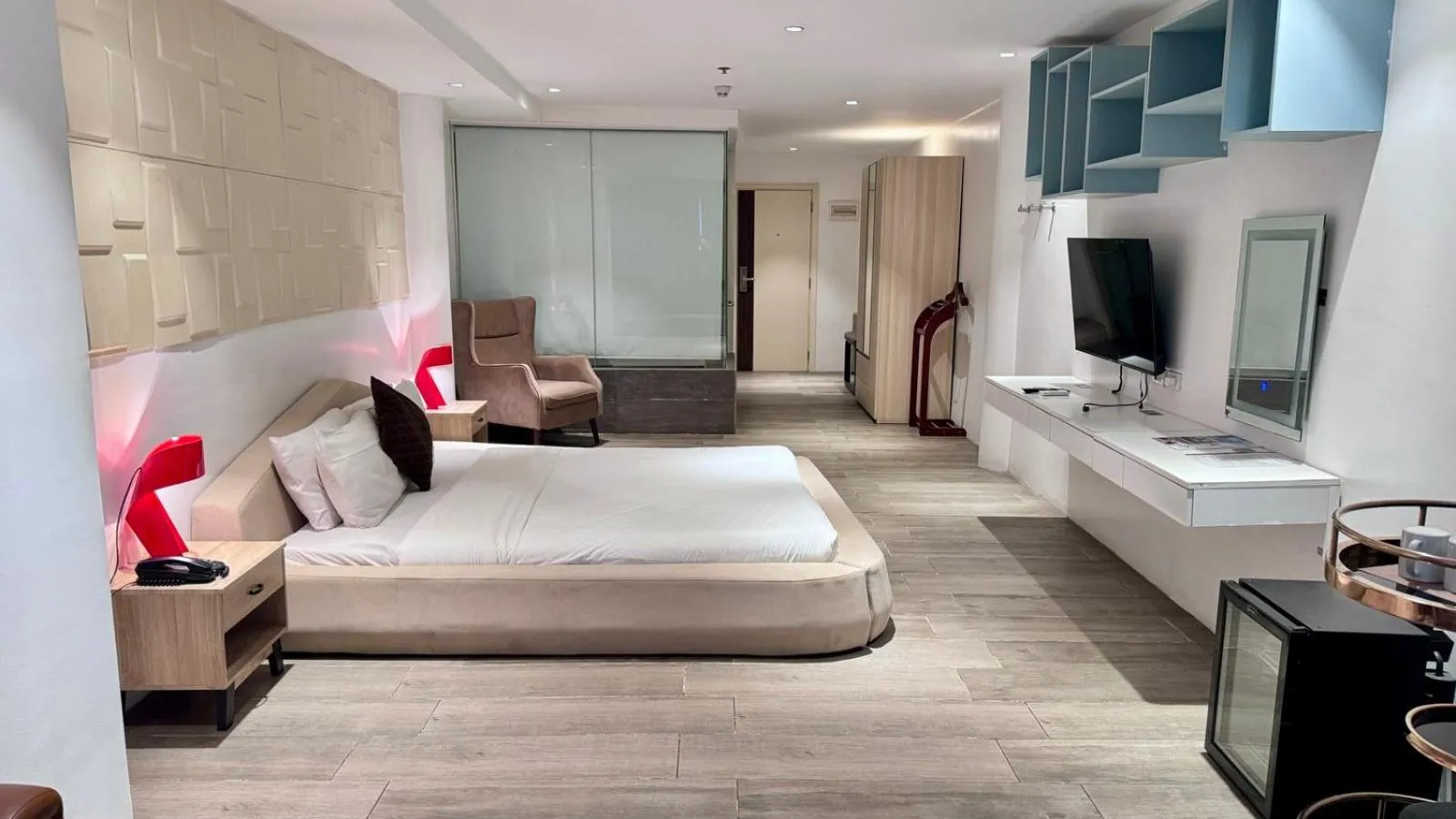 Bed in City Park Hotel Residences