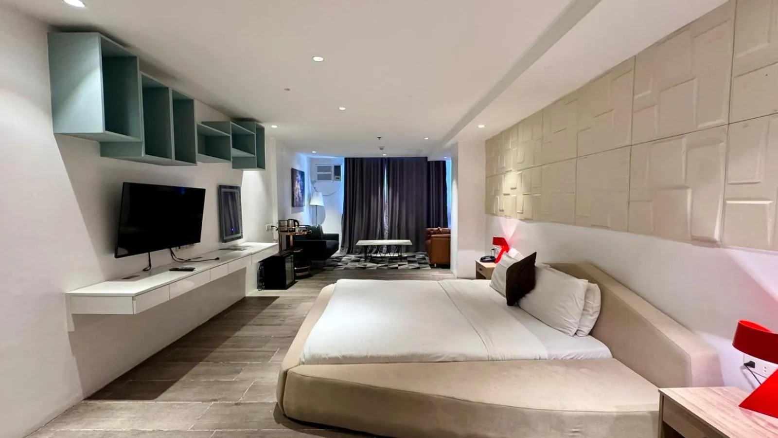 Bed in City Park Hotel Residences