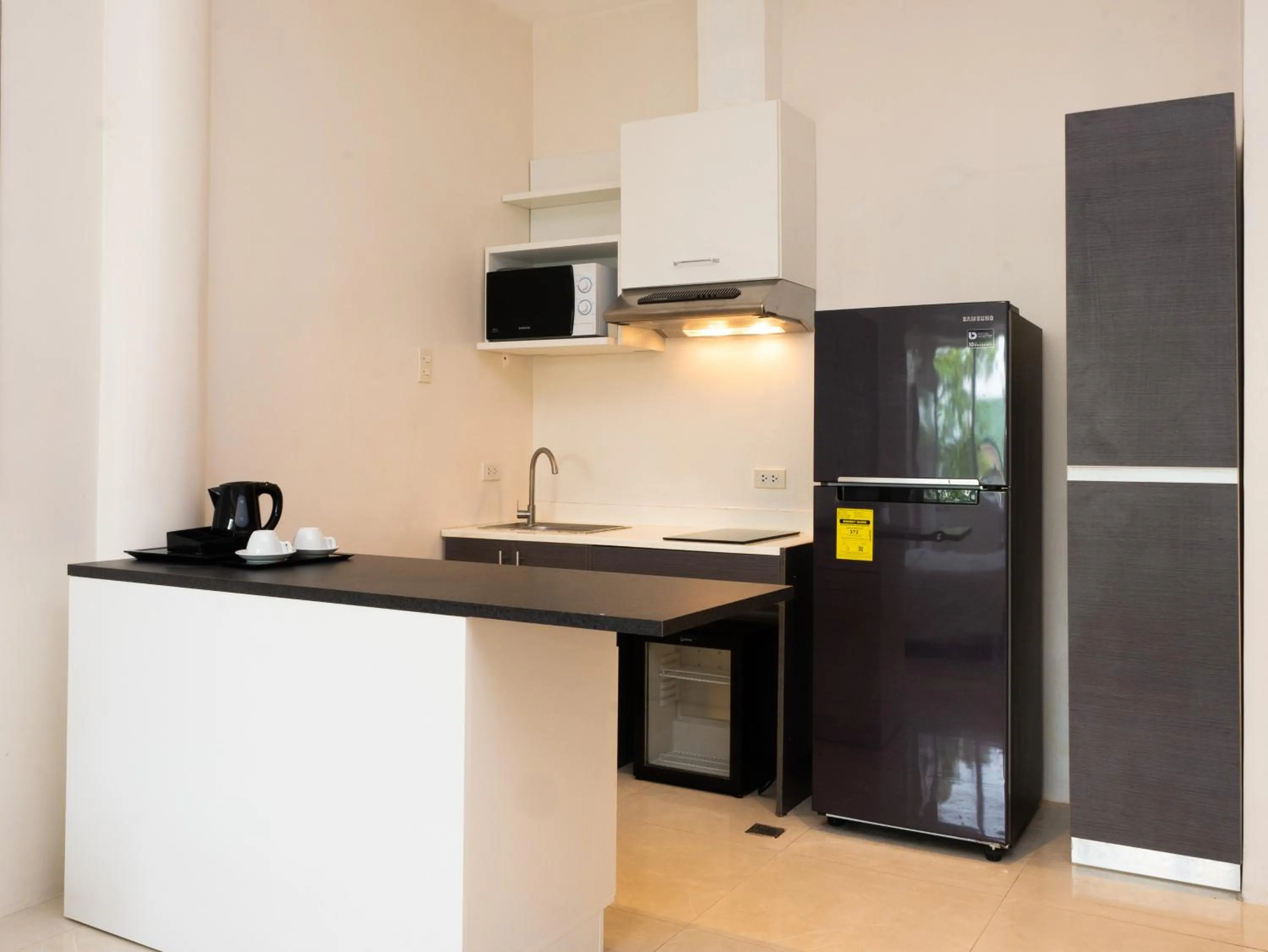 Kitchen or kitchenette in City Park Hotel Residences