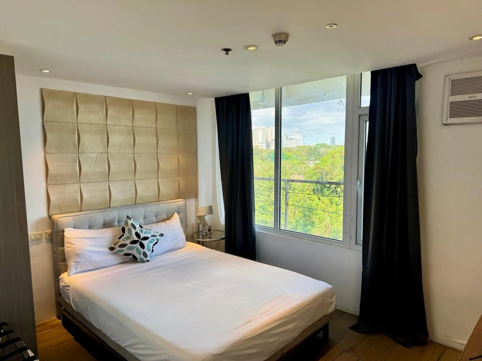 Bed in City Park Hotel Residences