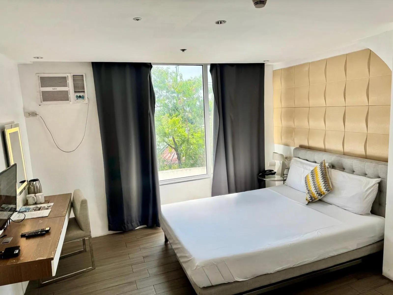 Bed in City Park Hotel Residences