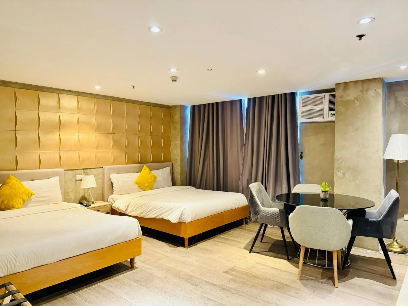 Bed in City Park Hotel Residences
